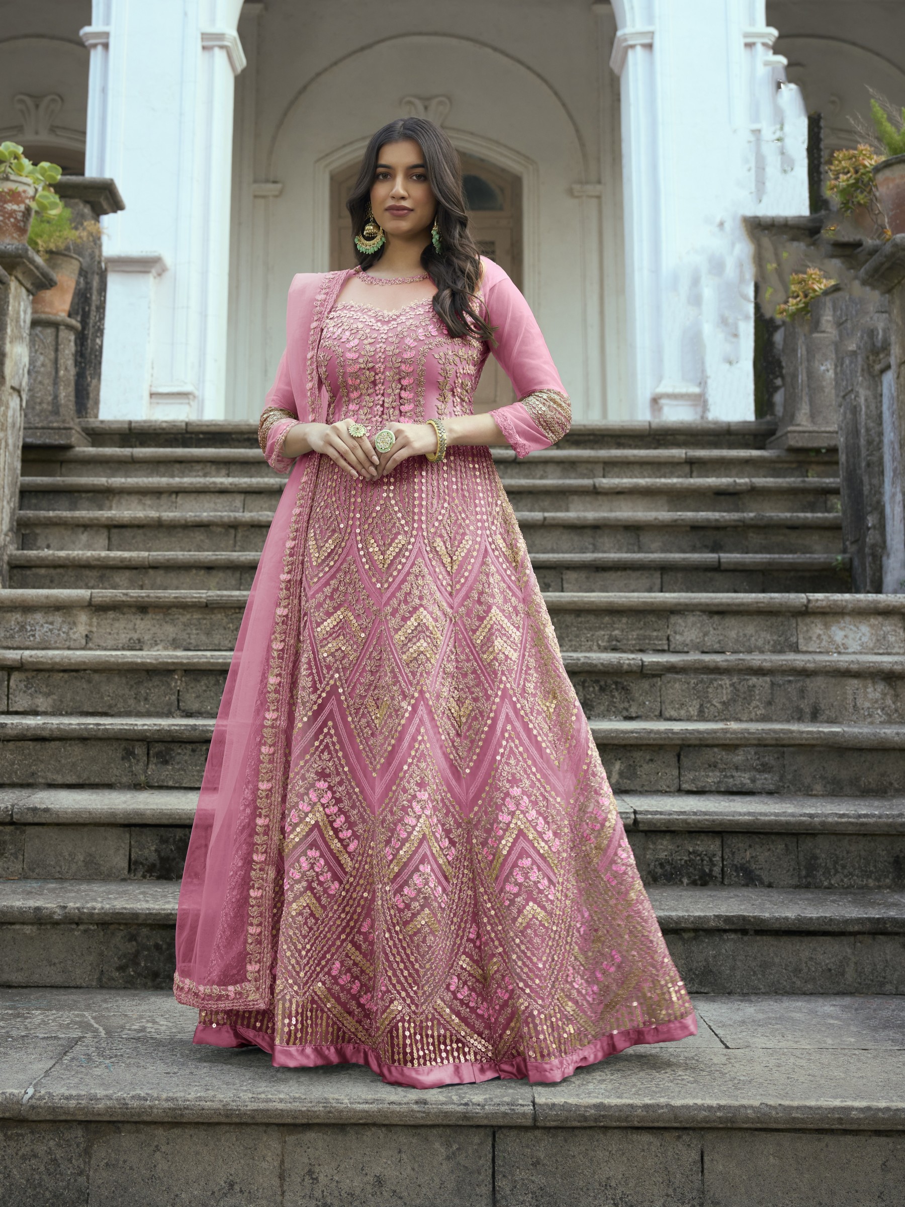 Butterfly Net Fabrics Party Wear Gown In Pink Color With Embroidery Work Gown