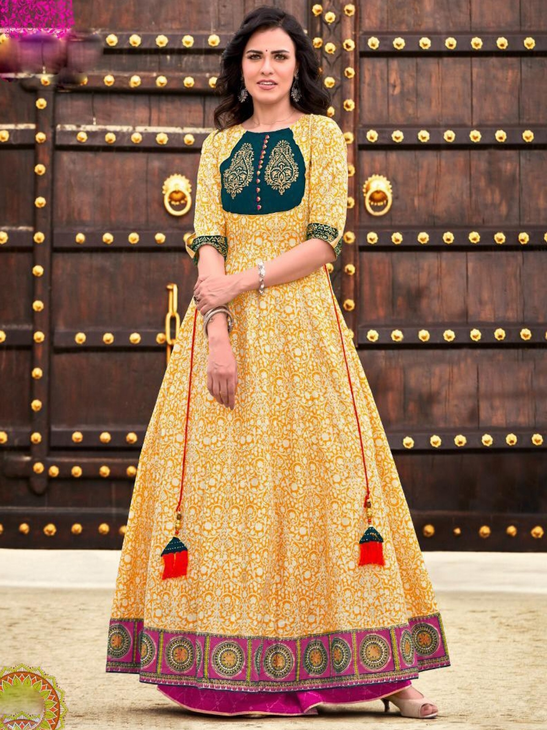 Heavy Lawn Cotton Casual Wear Top In Yellow Color With Embroidery