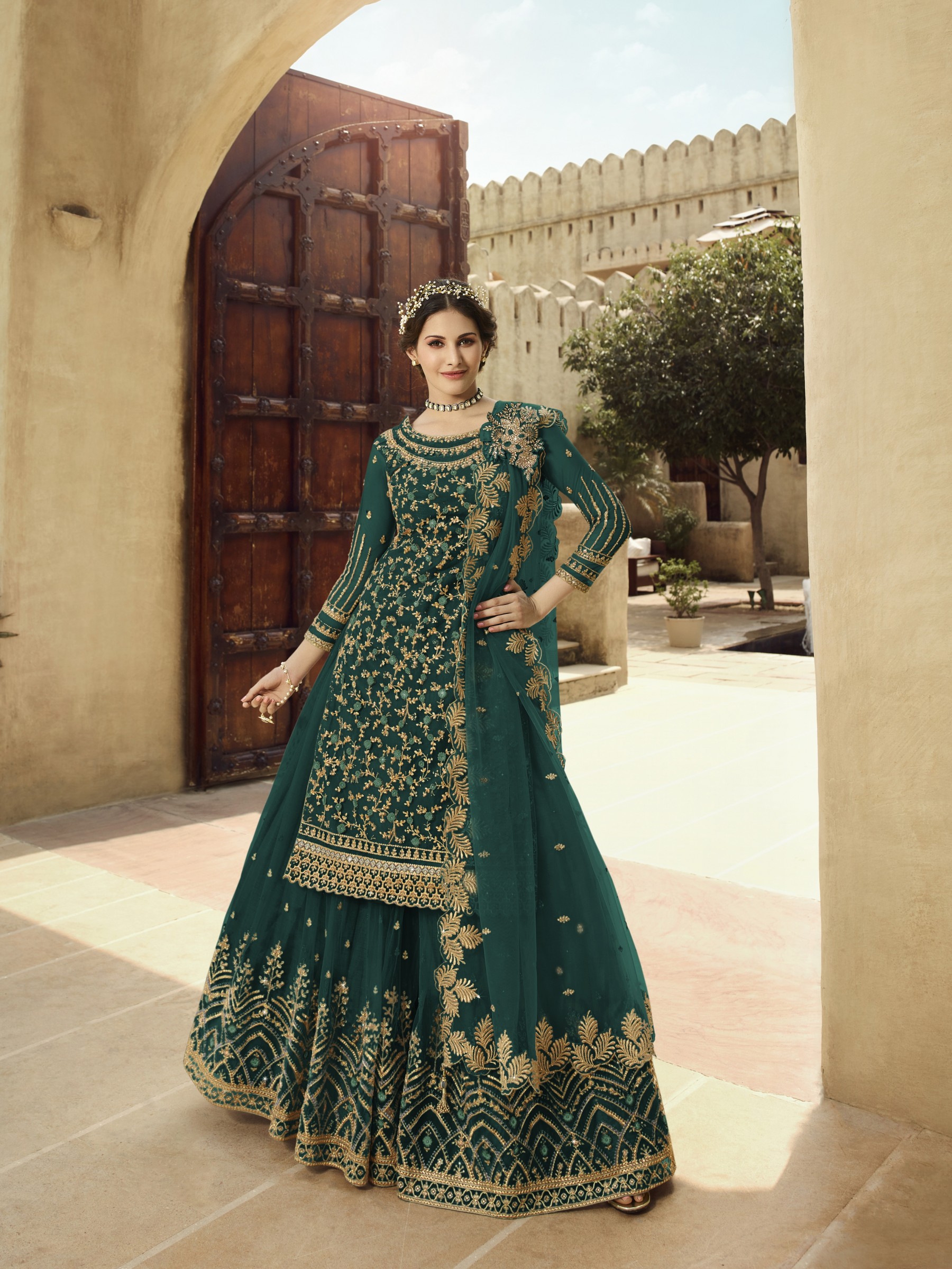 Soft Premium Net  Sharara in Teal Green color with  Embroidery & Stone work 