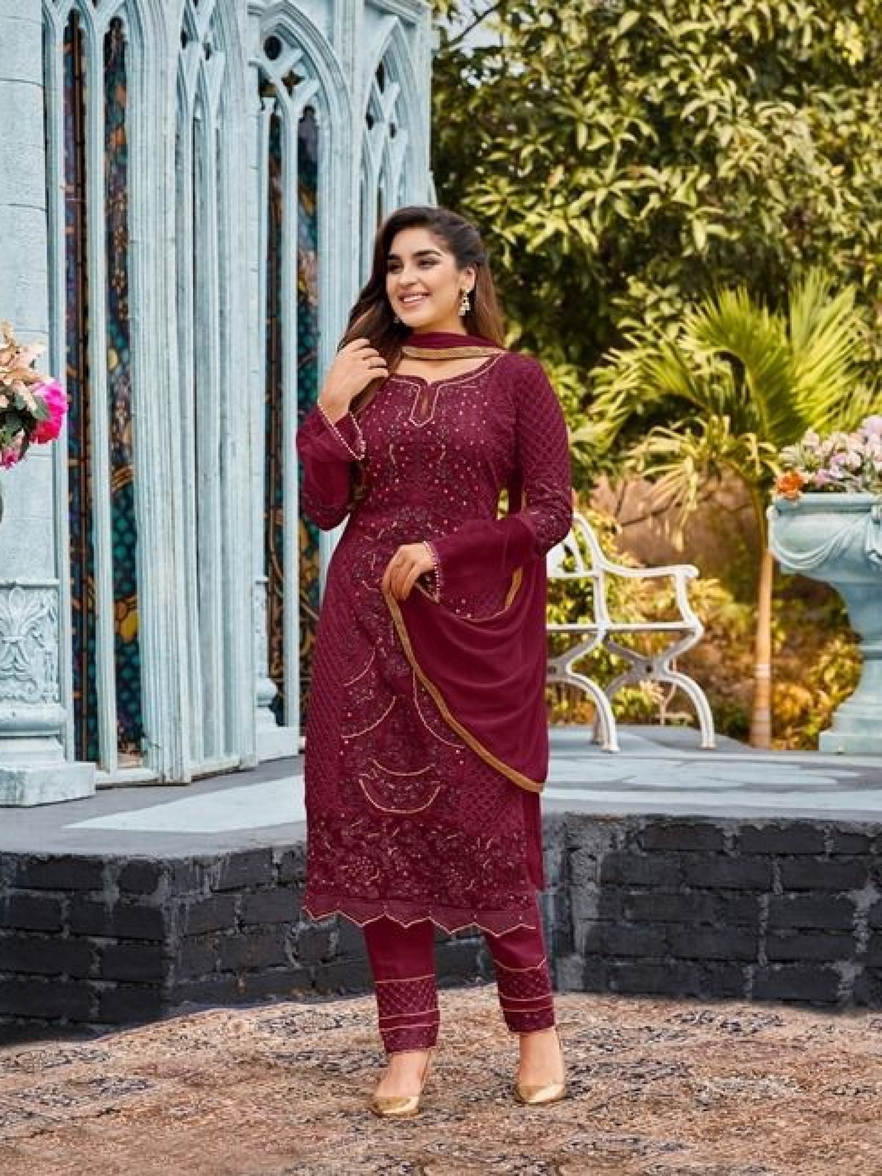 Pure Geogratte Fabrics Party Wear Suit  in Wine With Embroidery Work