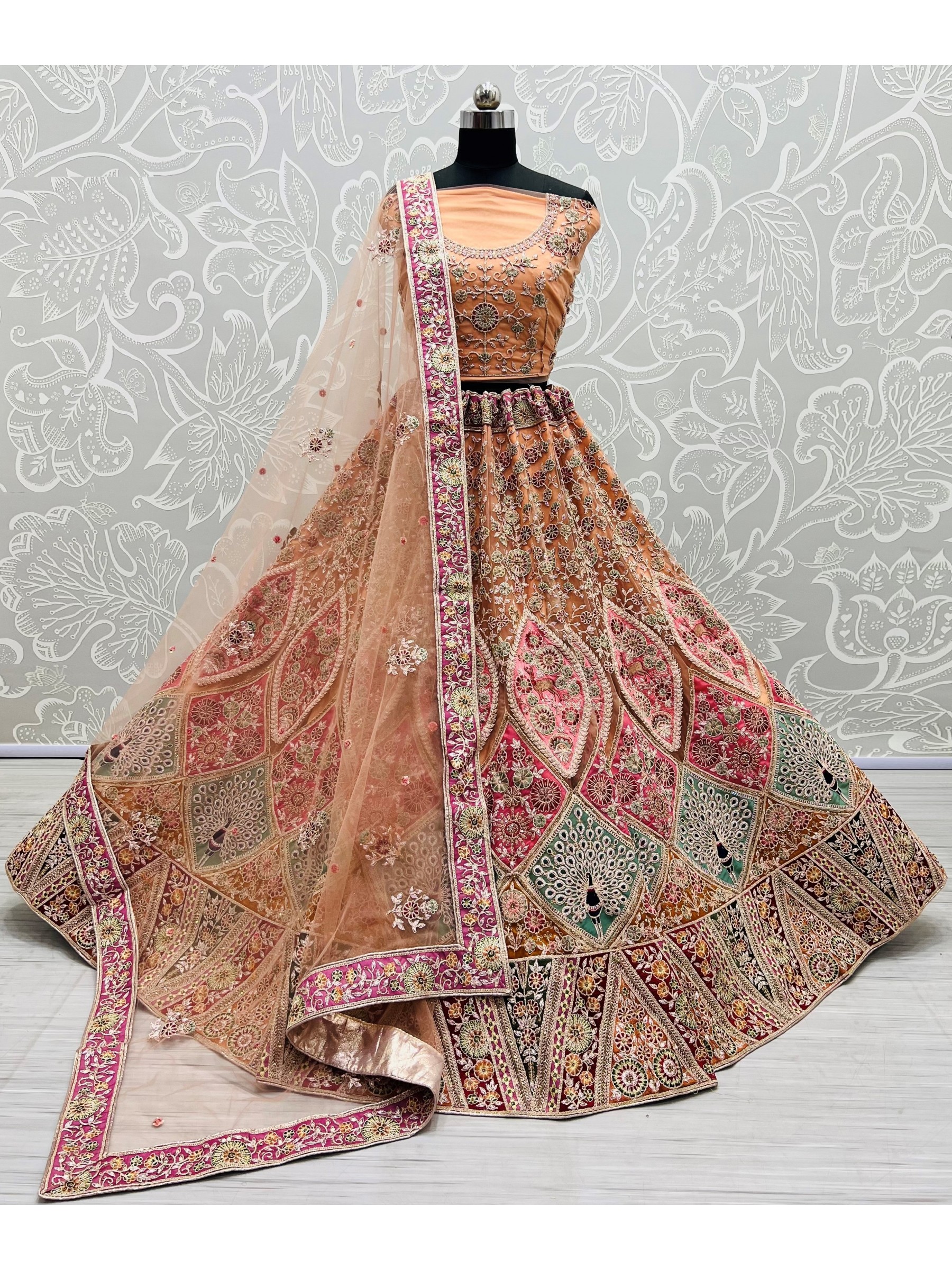 Soft Premium Net  Wedding Wear Lehenga In Peach Color With Embroidery Work and crystal stone work 