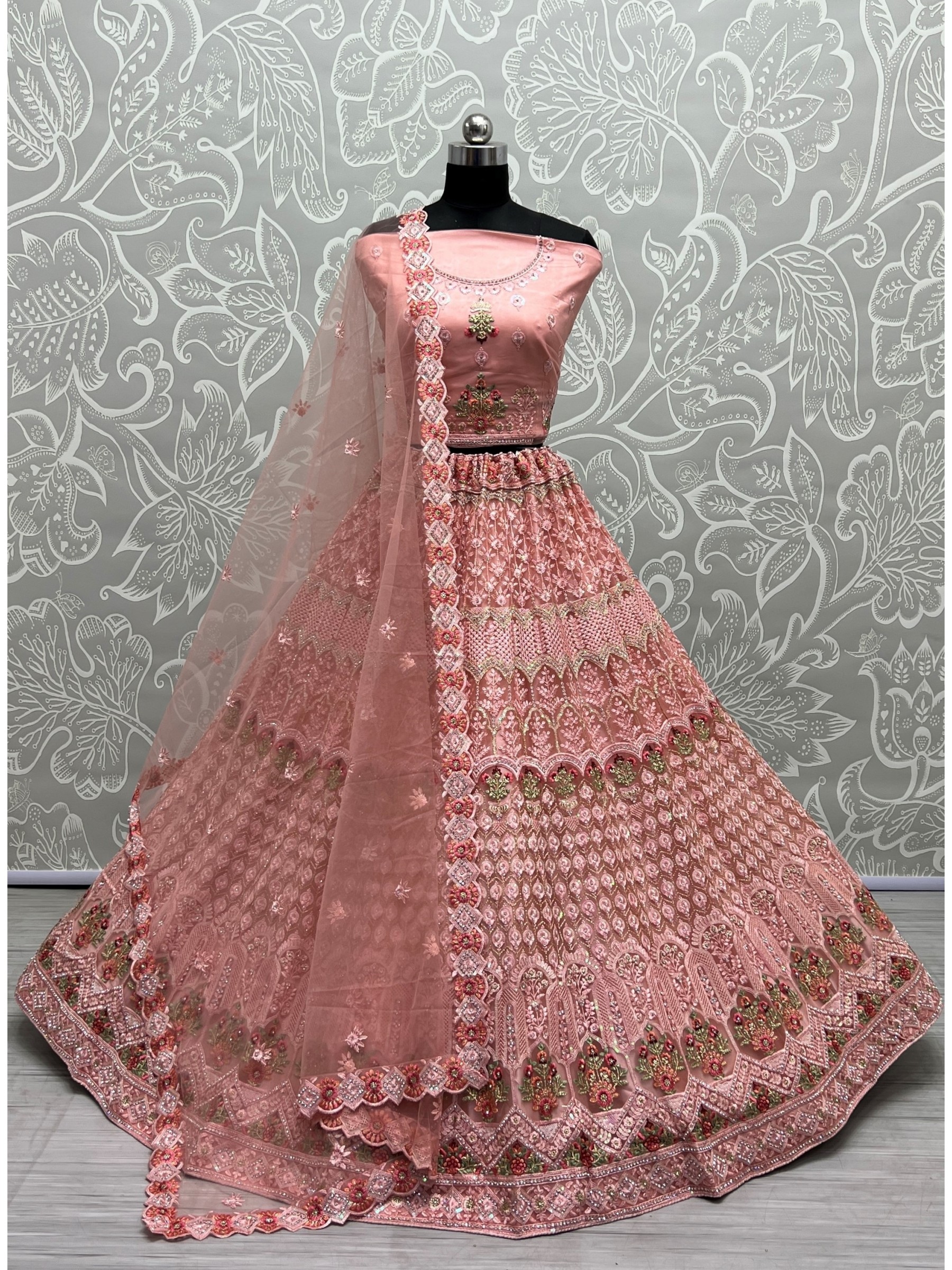 Soft Premium Net Wedding Wear Lehenga In Peach Color  With Embroidery Work