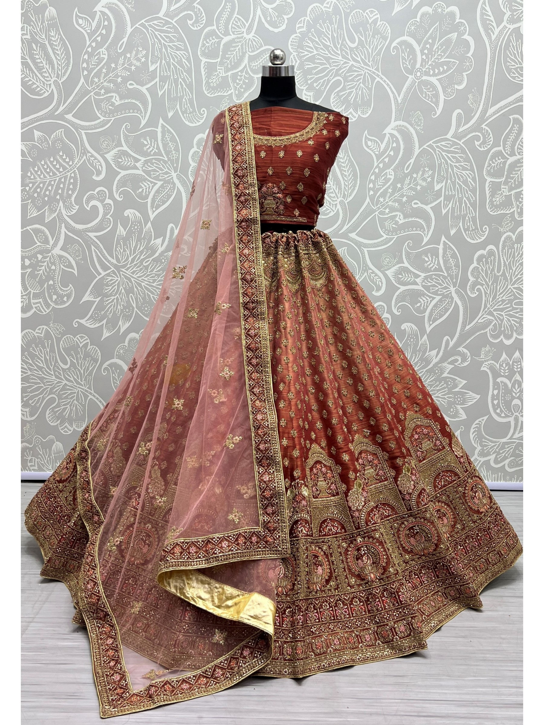 Soft Premium Net Wedding Wear Lehenga In Rust Color  With Embroidery Work