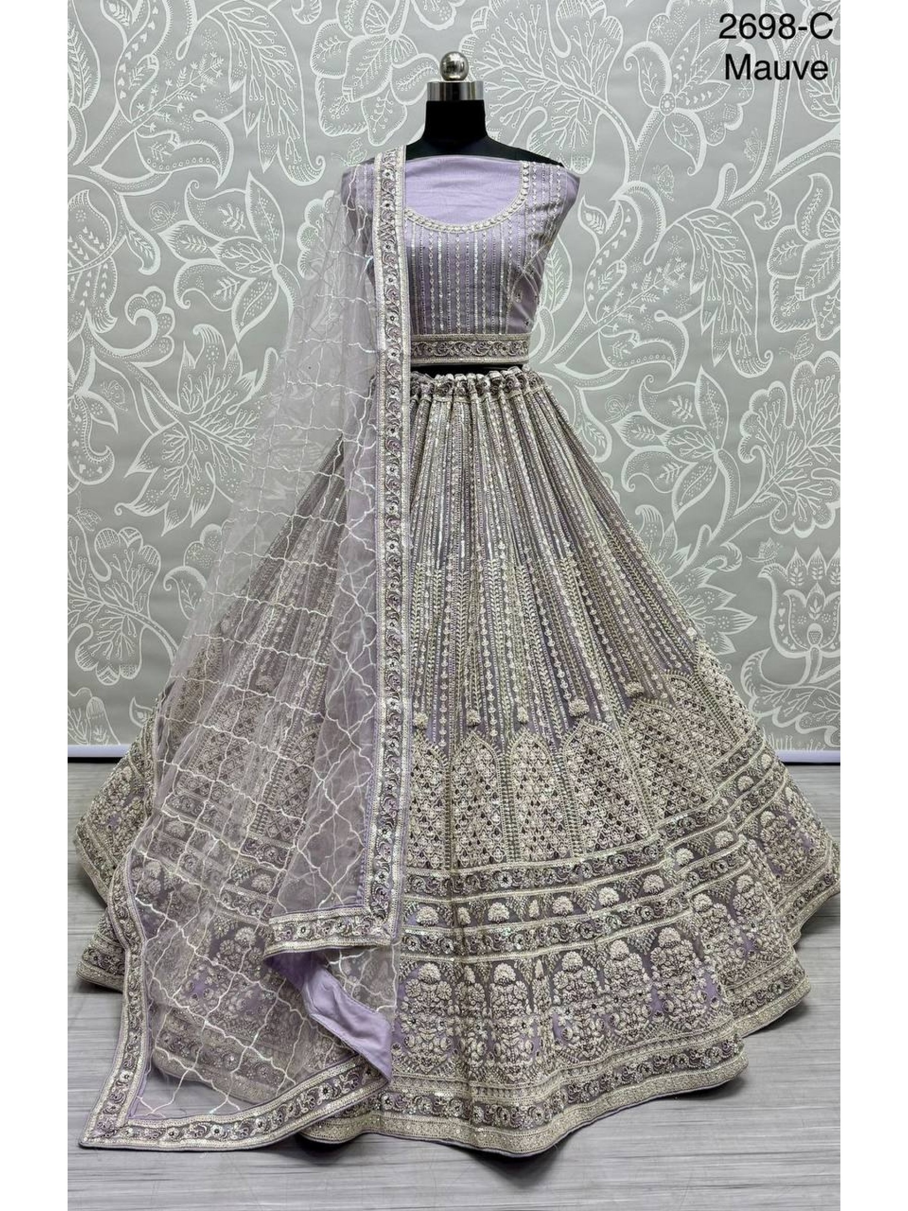Soft Premium Net Wedding Wear Lehenga In Mauve Color With Embroidery Work
