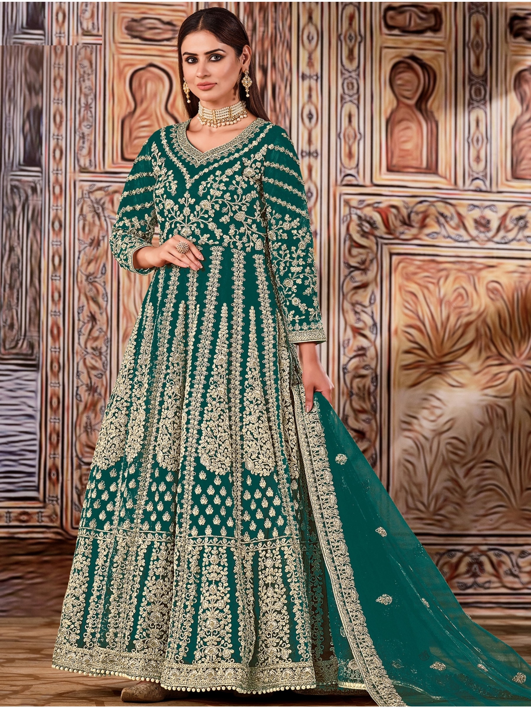 Soft Premium Net Party Wear Gown In Green Color with Embroidery Work