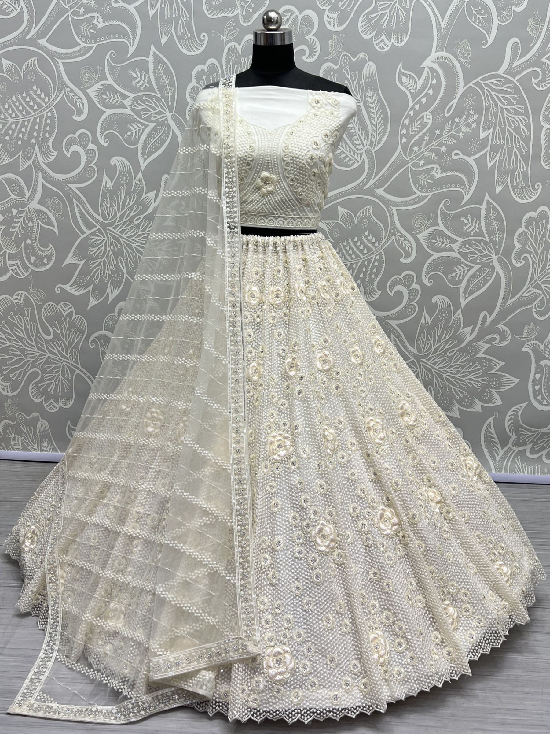 Soft Premium Net Wedding Wear Lehenga In Off White Color With Embroidery Work