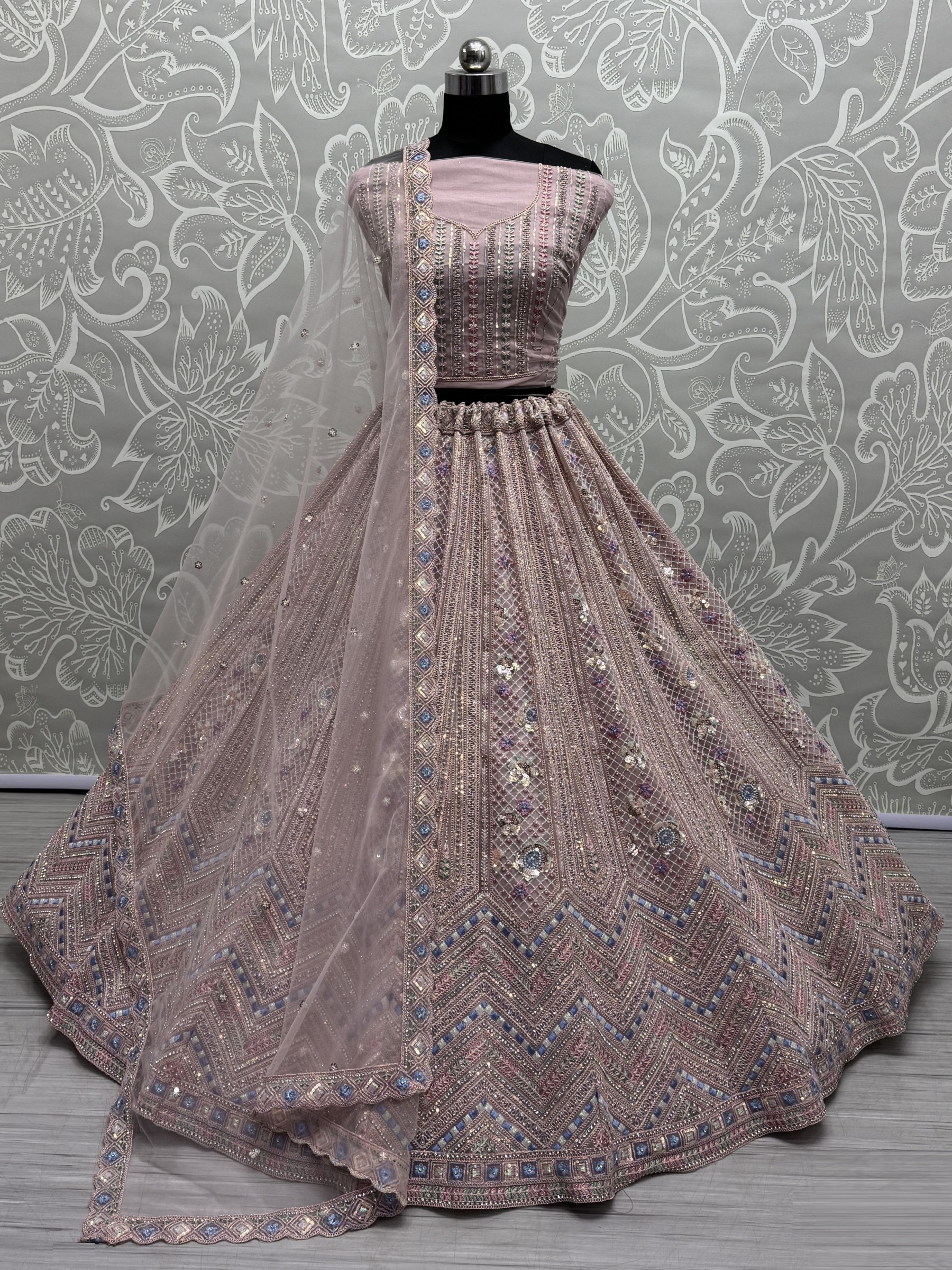 Soft Premium Net Fabric Wedding Wear Lehenga In Peach Pink Color With Embroidery Work