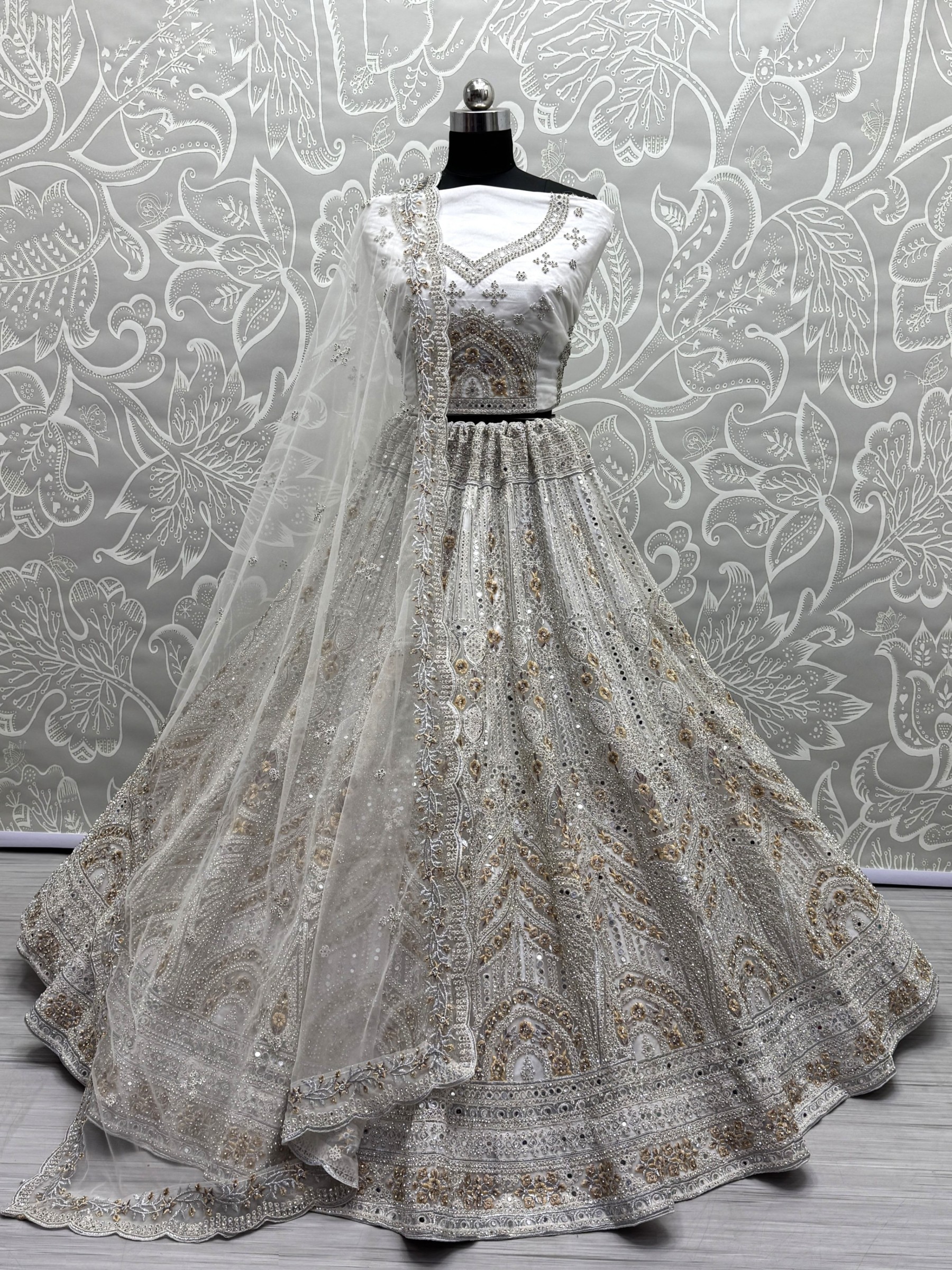 Soft Premium Net Fabric Wedding Wear Lehenga In Off White Color With Embroidery Work