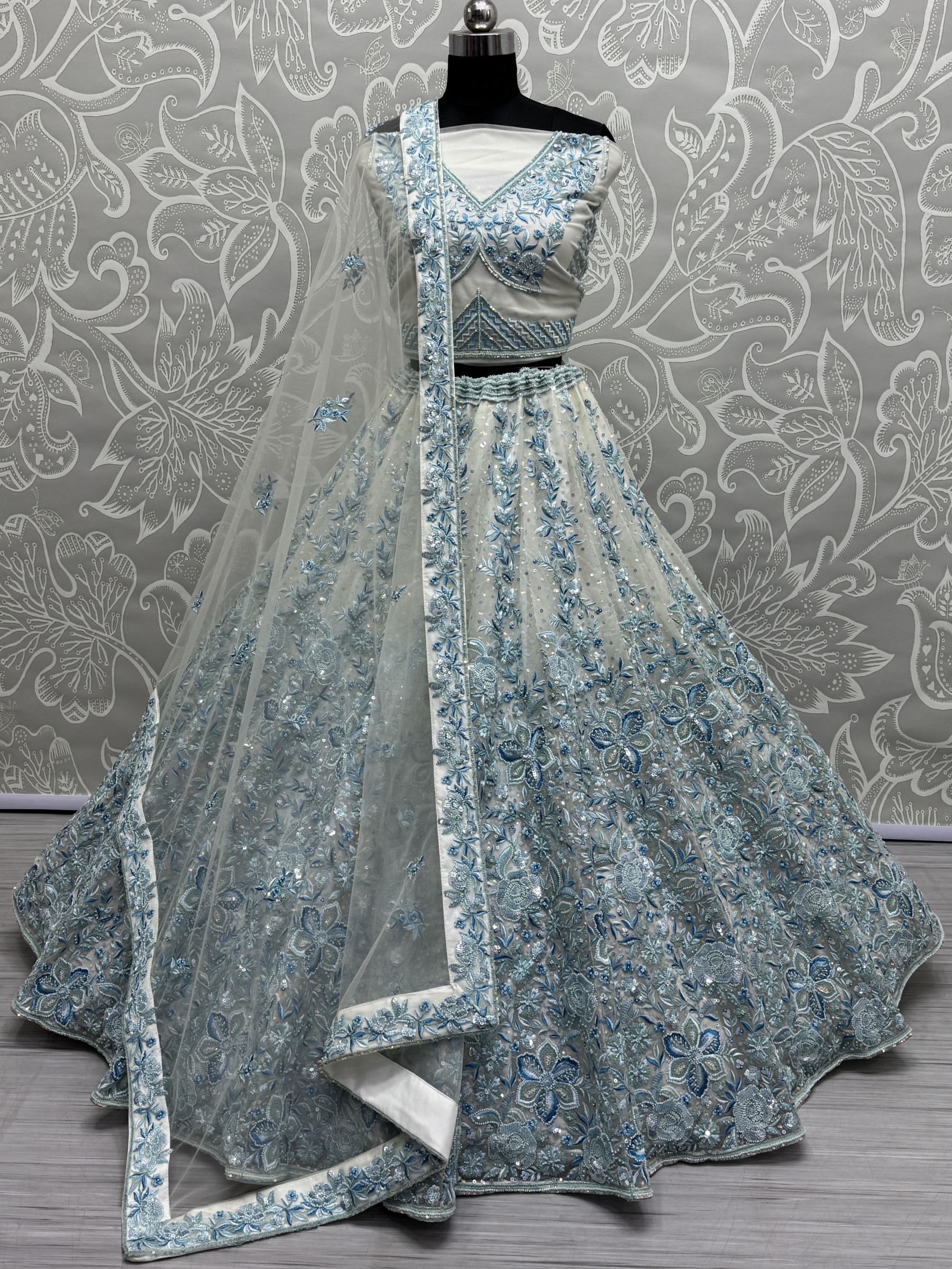 Soft Premium Net Fabric Wedding Wear Lehenga In Sky Blue Color With Embroidery Work