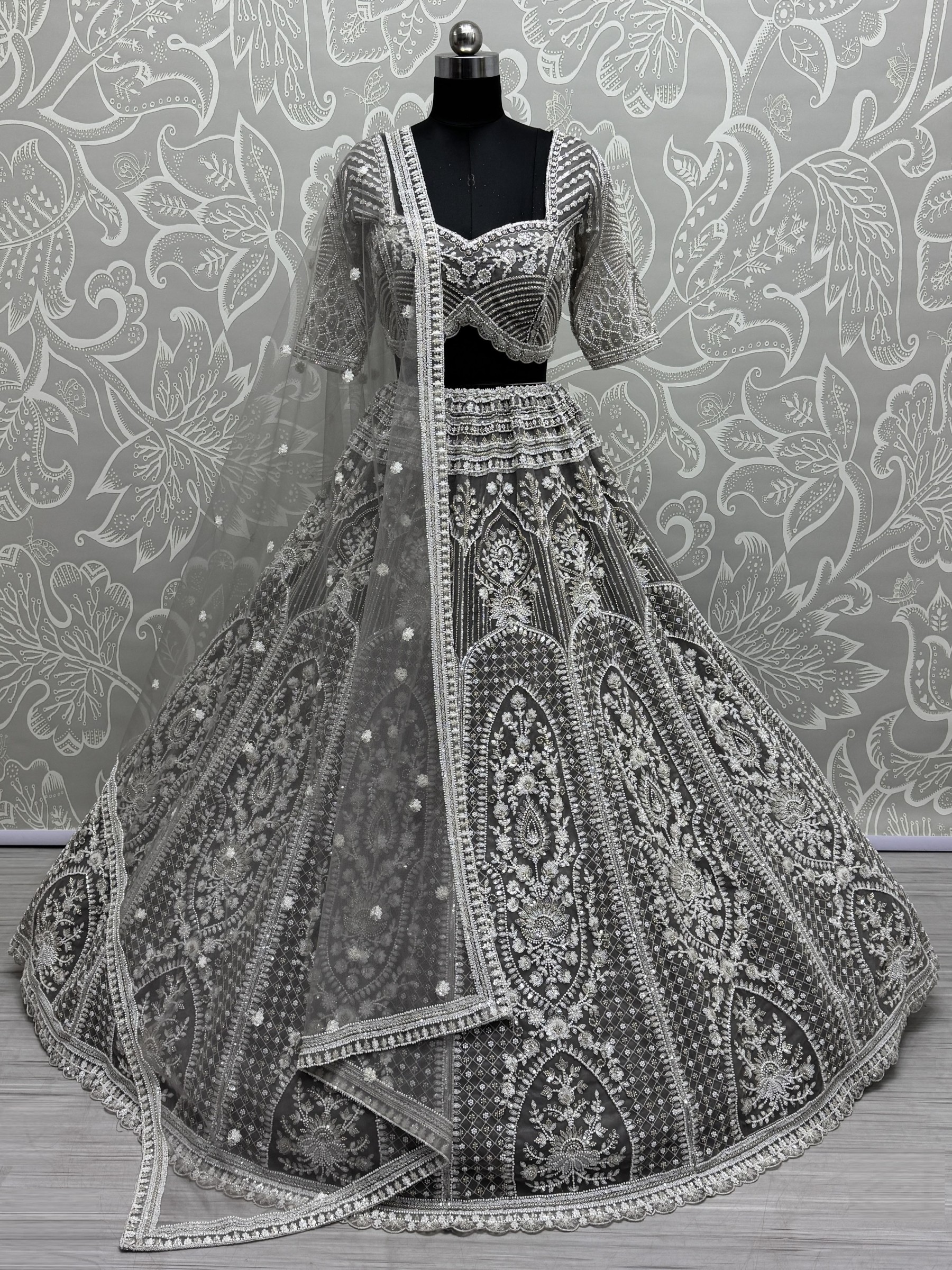 Soft Premium Net Fabric Wedding Wear Lehenga In Stone Grey Color With Embroidery Work
