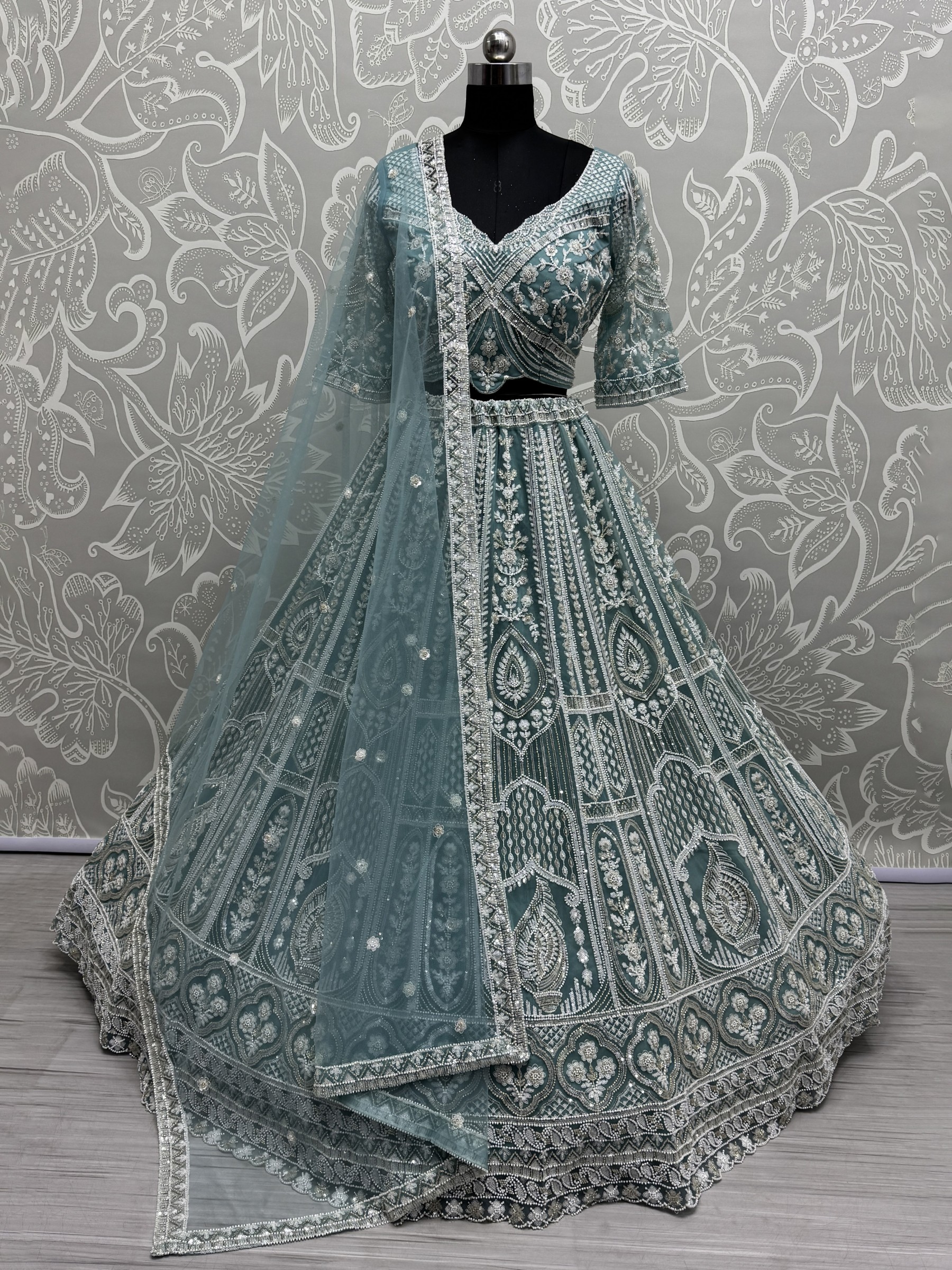 Soft Premium Net Fabric Wedding Wear Lehenga In Sky Blue Color With Embroidery Work