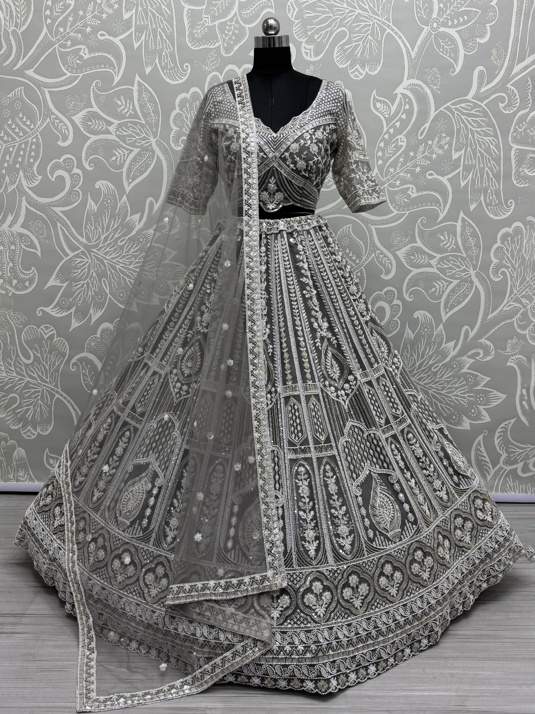 Soft Premium Net Fabric Wedding Wear Lehenga In Stone Grey Color With Embroidery Work