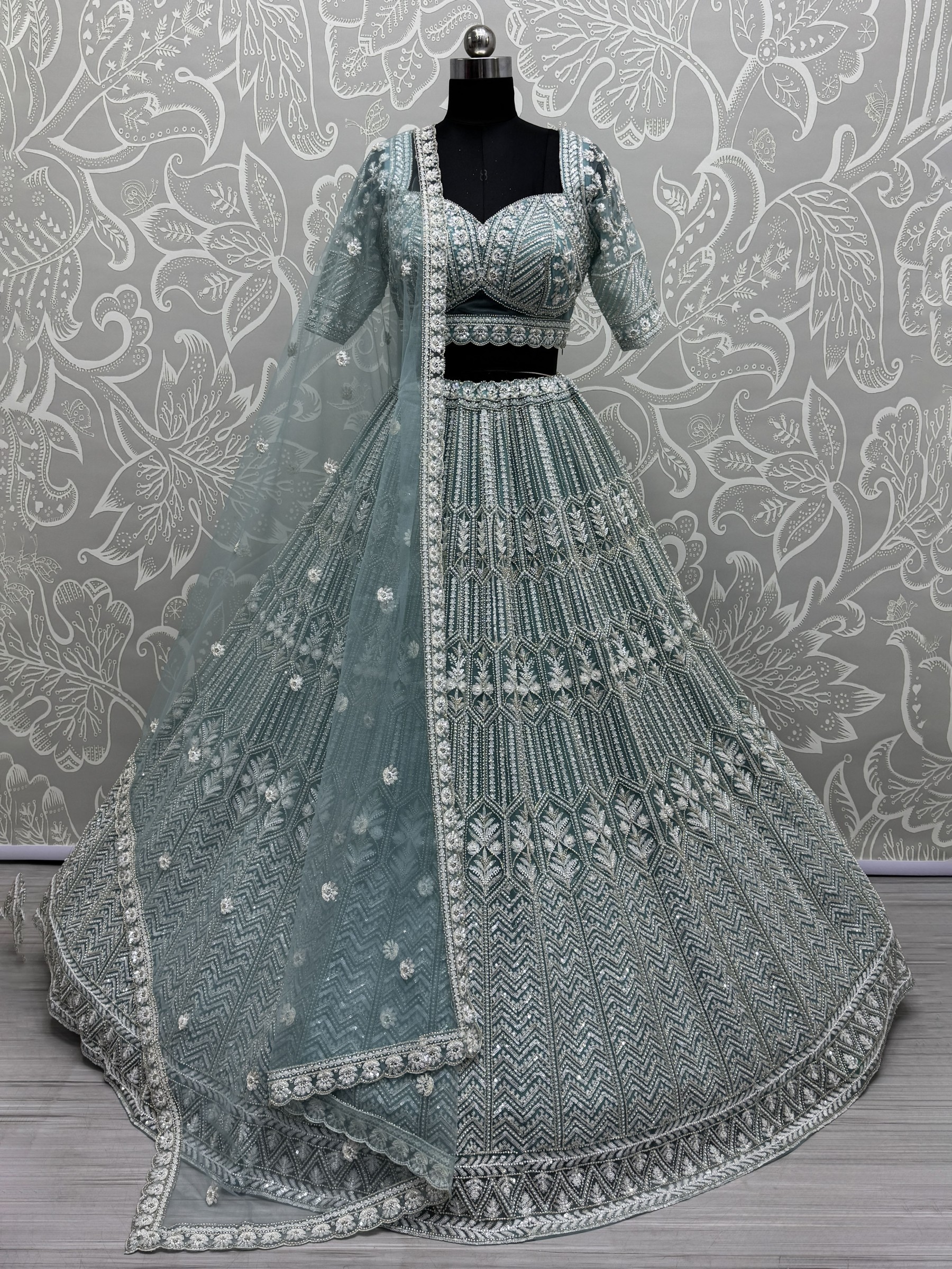 Soft Premium Net Fabric Wedding Wear Lehenga In Turquoise Color With Embroidery Work