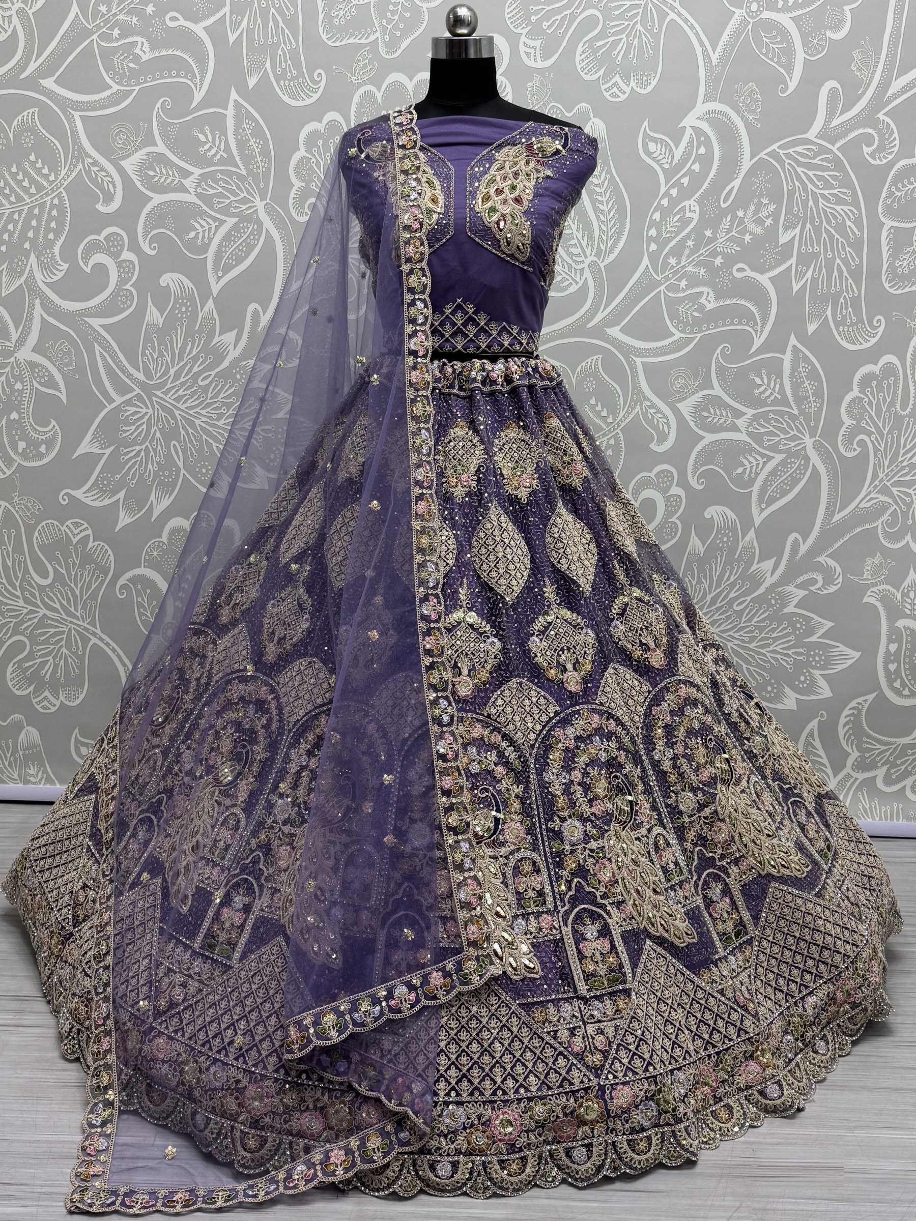 Soft Premium Net Wedding Wear Lehenga In Violet Color With Embroidery Work