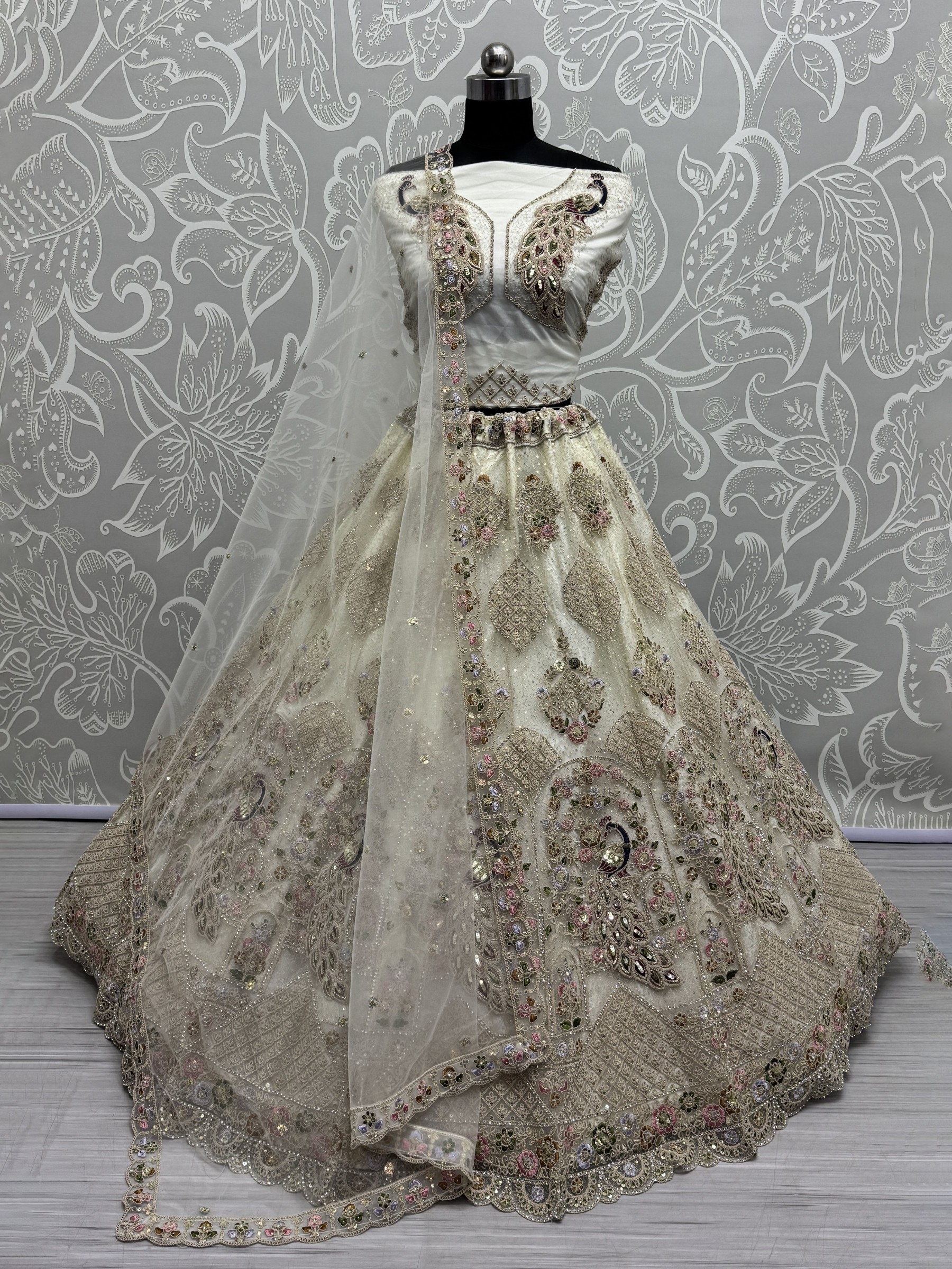 Soft Premium Net Wedding Wear Lehenga In Off White Color With Embroidery Work