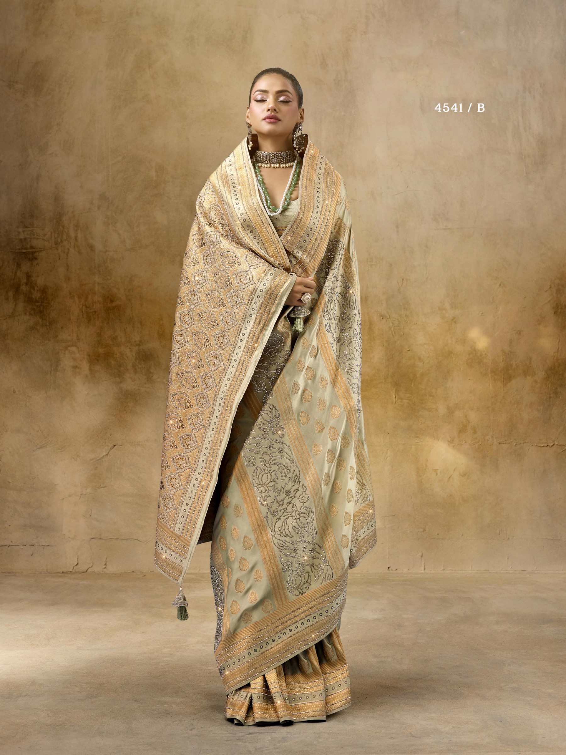 Kadwa Kasab Silk Party wear Saree In Biege Color with Swaroskvi Work 