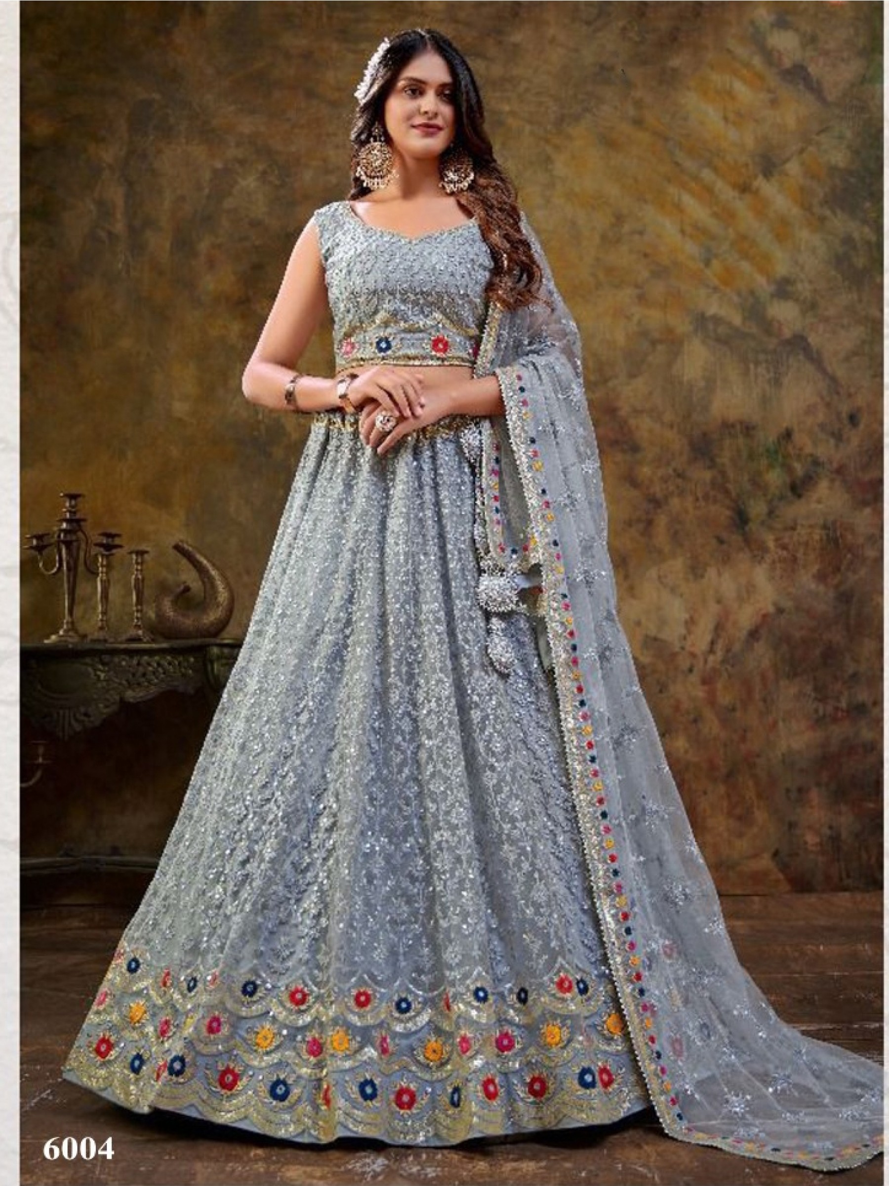 Soft Premium Net Party Wear Wear Lehenga In Blue With Embroidery Work 