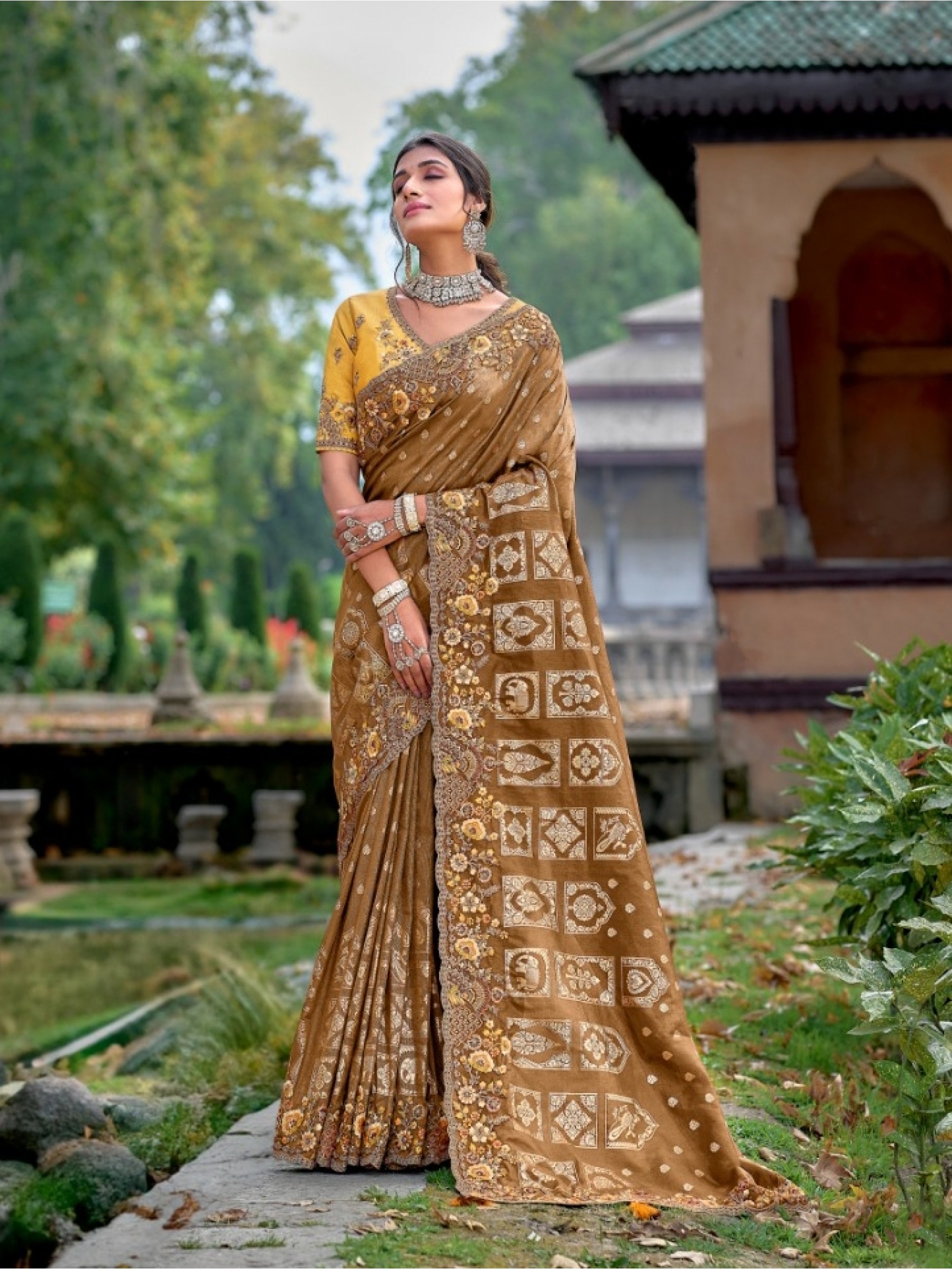 Pure Dola Silk Saree In Brown Color With Embroidery Work