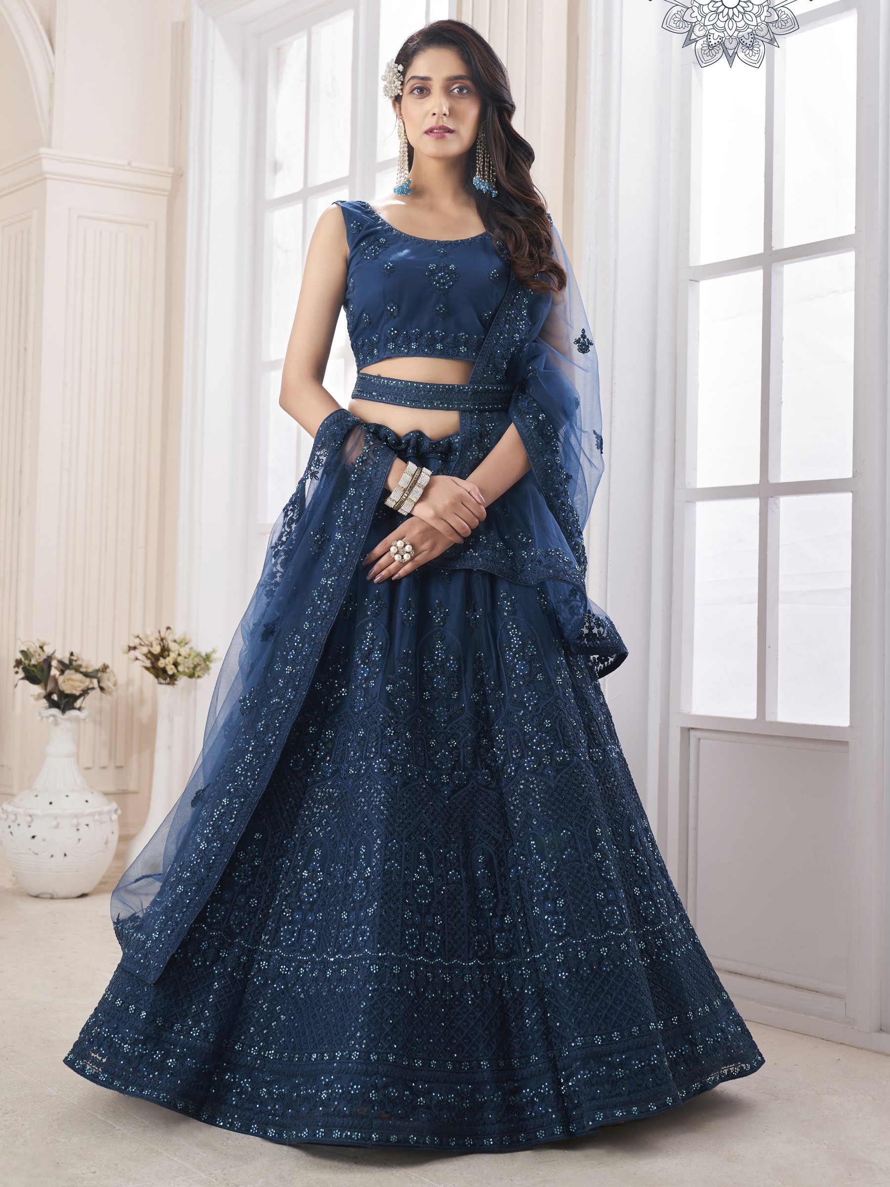 Soft Premium Net Wedding Wear Wear Lehenga In Teal Blue Color With Embroidery Work 