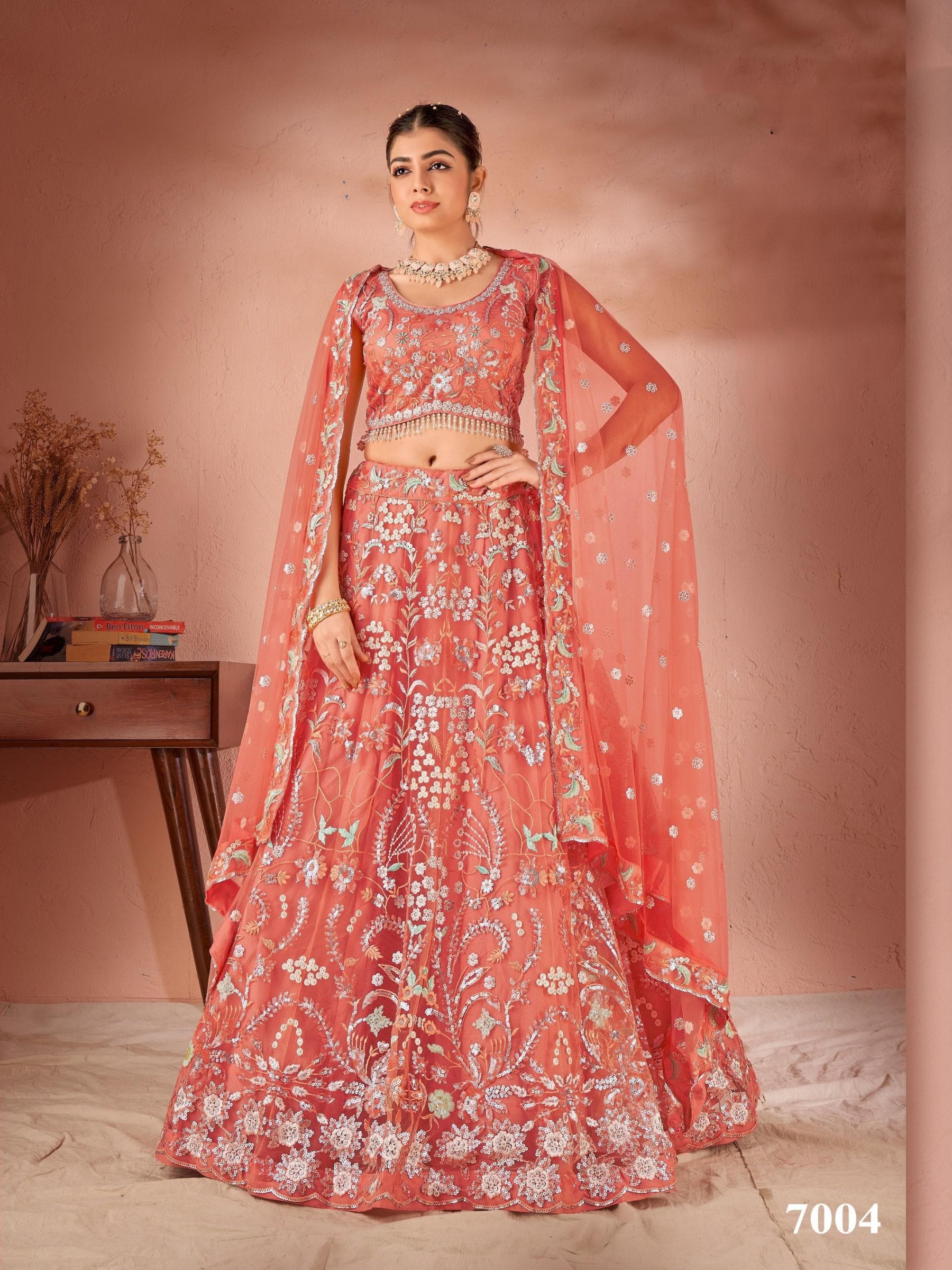 Soft Premium Net Party Wear Wear Lehenga In Peach With Embroidery Work 