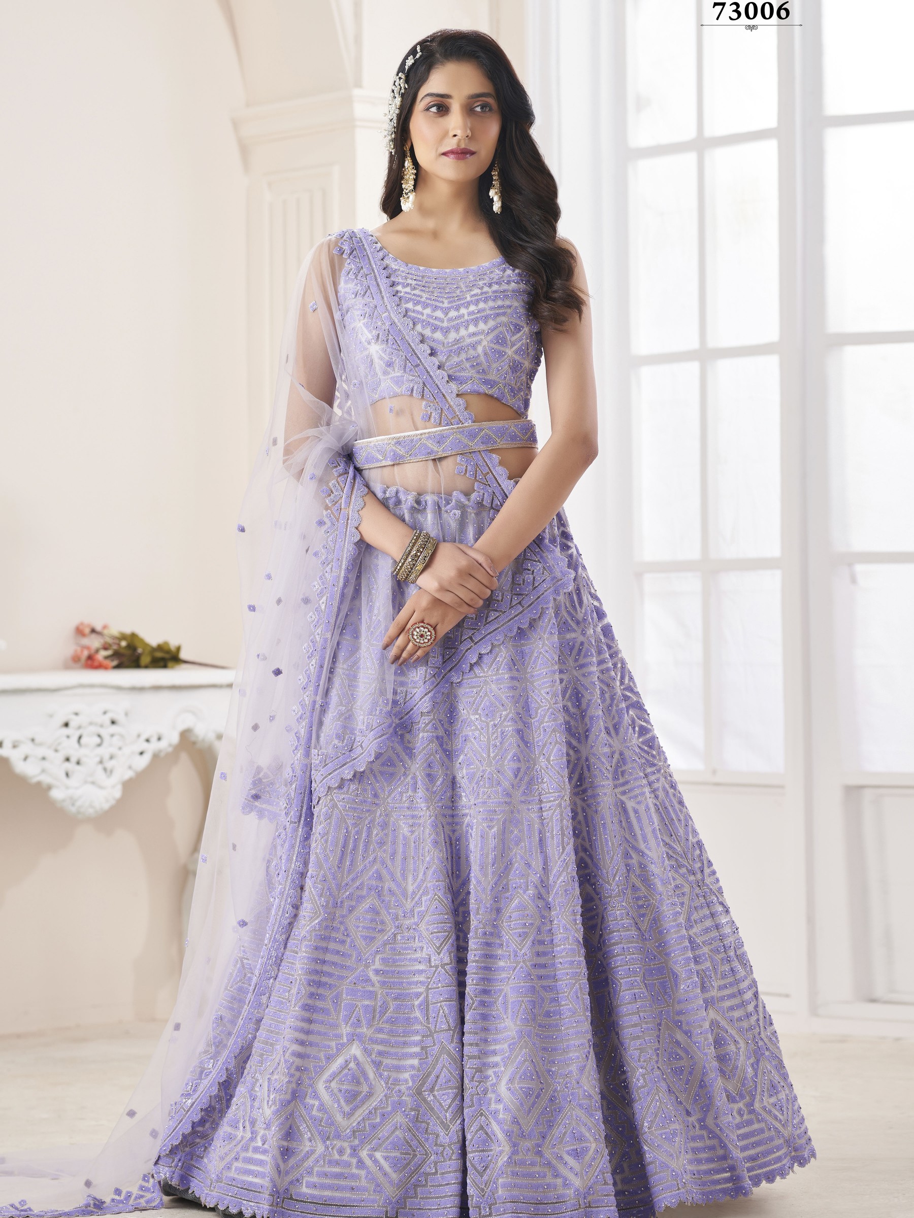 Soft Premium Net Fabrics  Wedding Wear Lehenga in Lavender Color With Embroidery Work