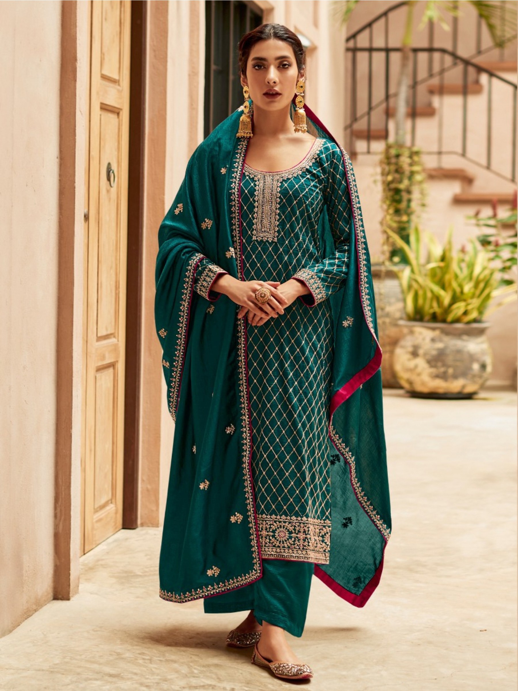 Heritage Silk Fabrics Party Wear Suit In Green Color With Embroidery Work