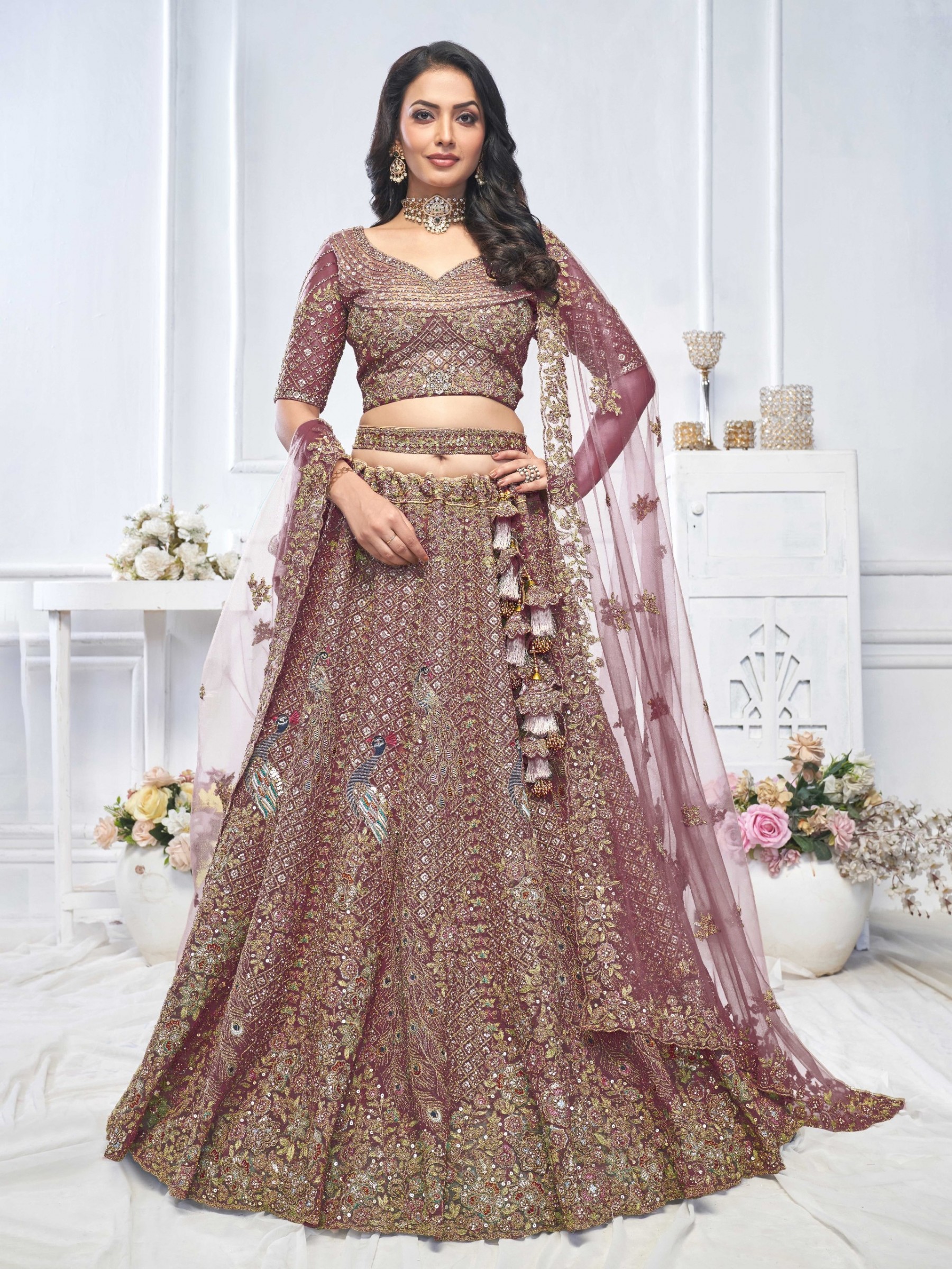 Soft Premium Net Wedding Wear Lehenga In Onion Color With Embroidery Work