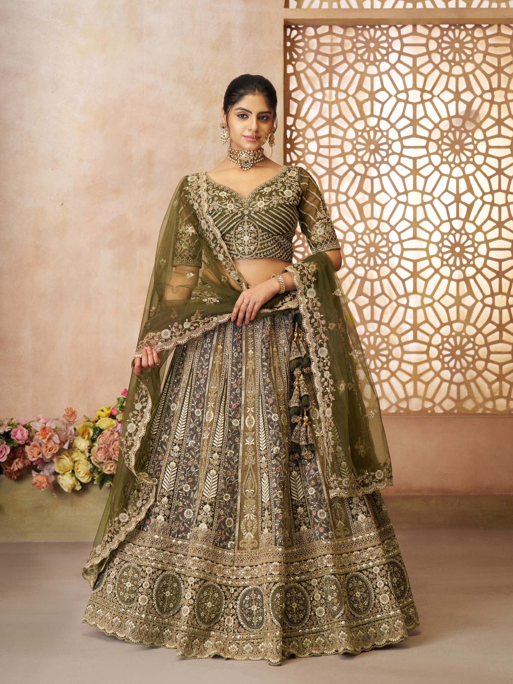 Soft Premium Net Wedding Wear Lehenga In Mahendi Green Color With Embroidery Work