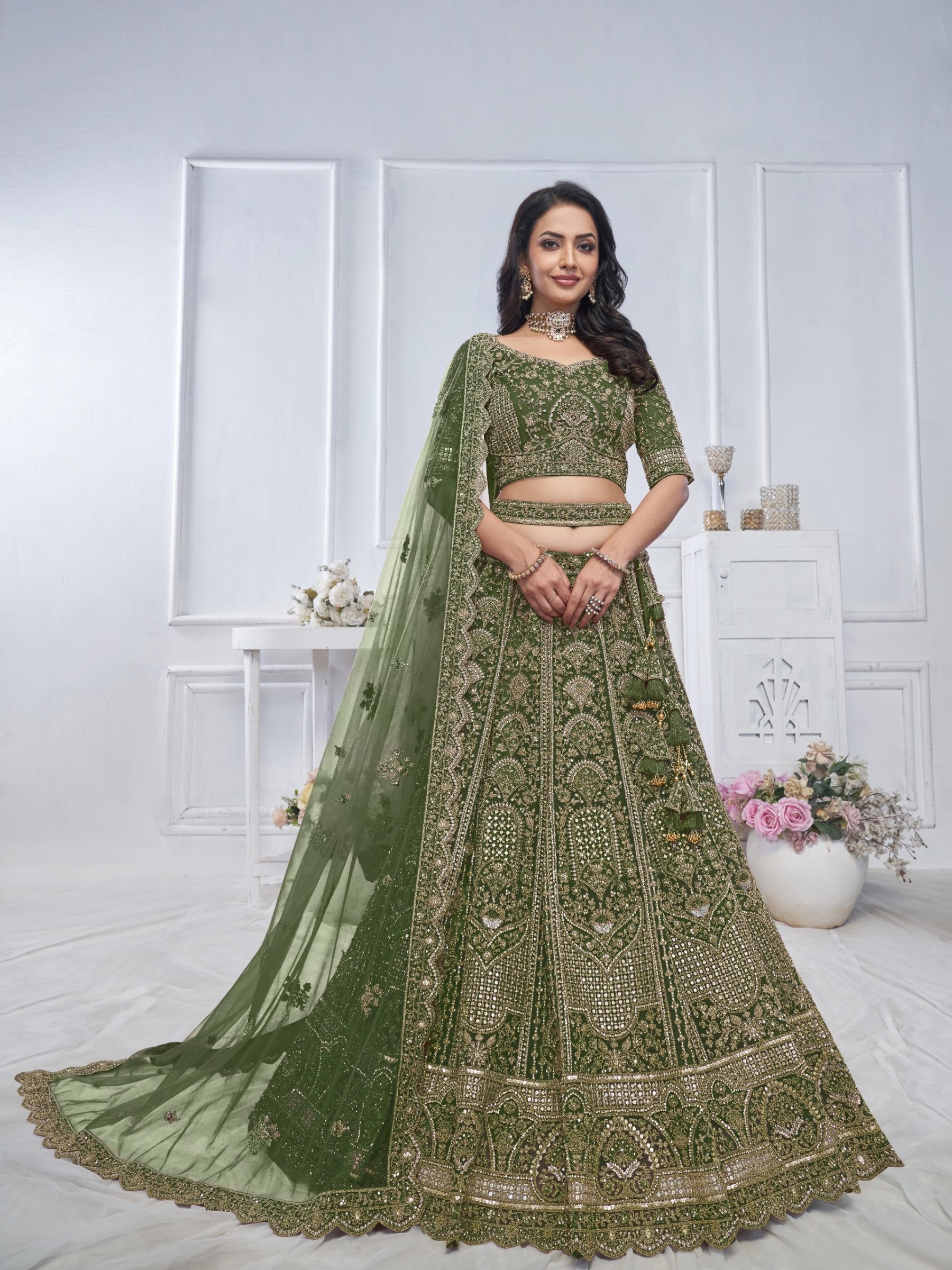 Soft Premium Net Wedding Wear Lehenga In Green Color With Embroidery Work