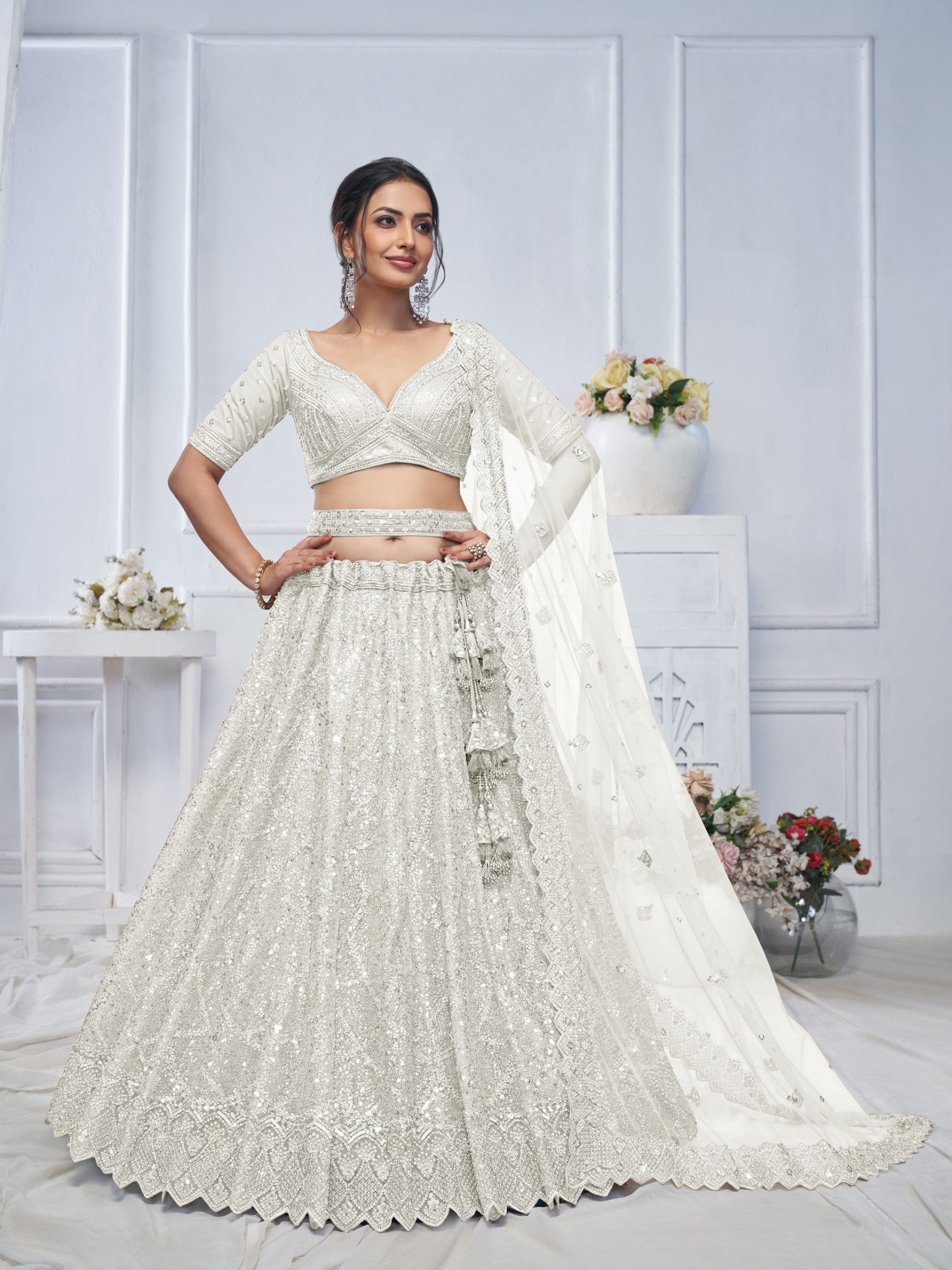 Soft Premium Net Wedding Wear Lehenga In Ivory Off White Color With Embroidery Work