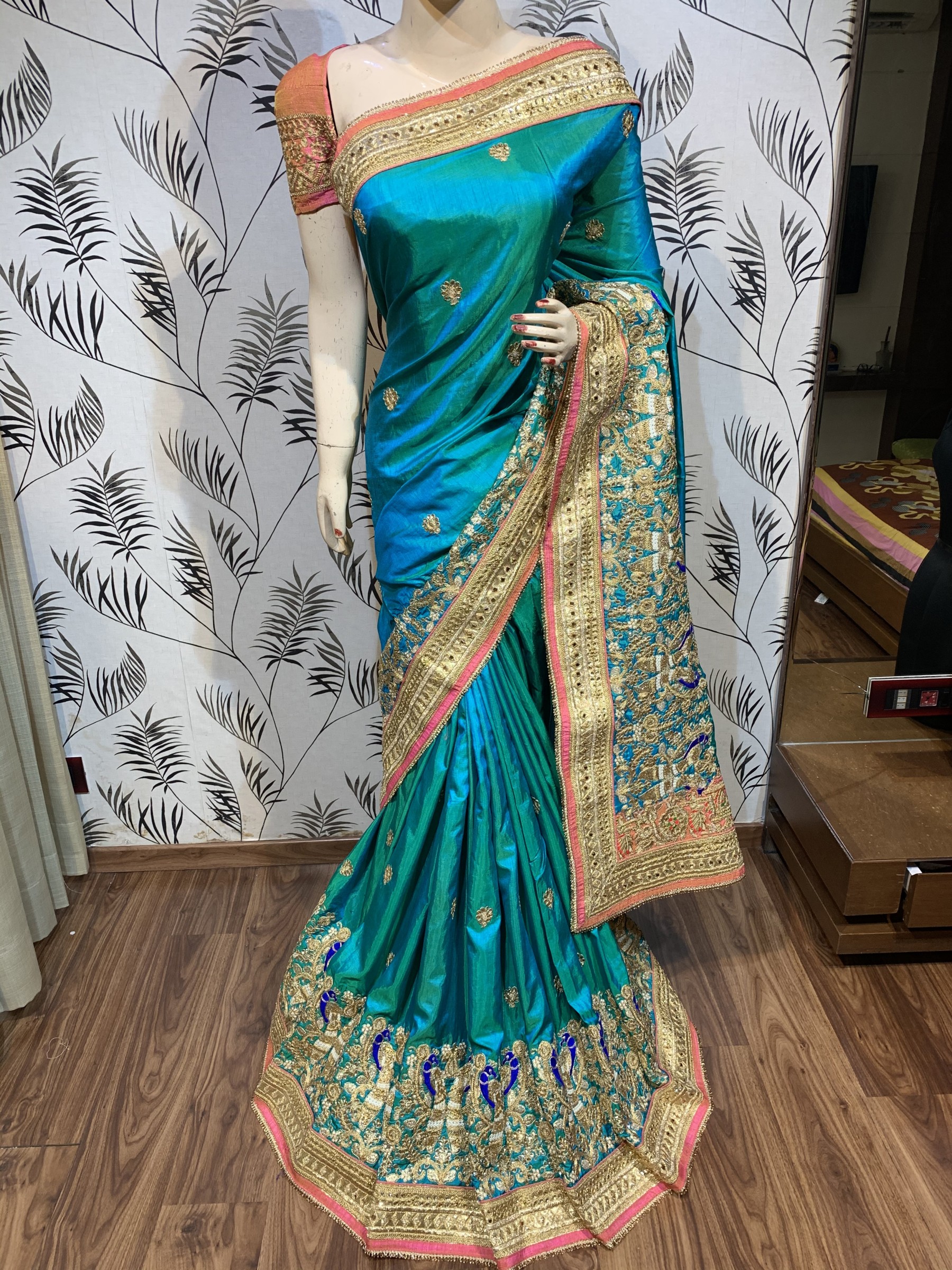 Mal Mal Silk Wedding Wear Saree In Turquoise color With Embroidery Work & Crystal stone work