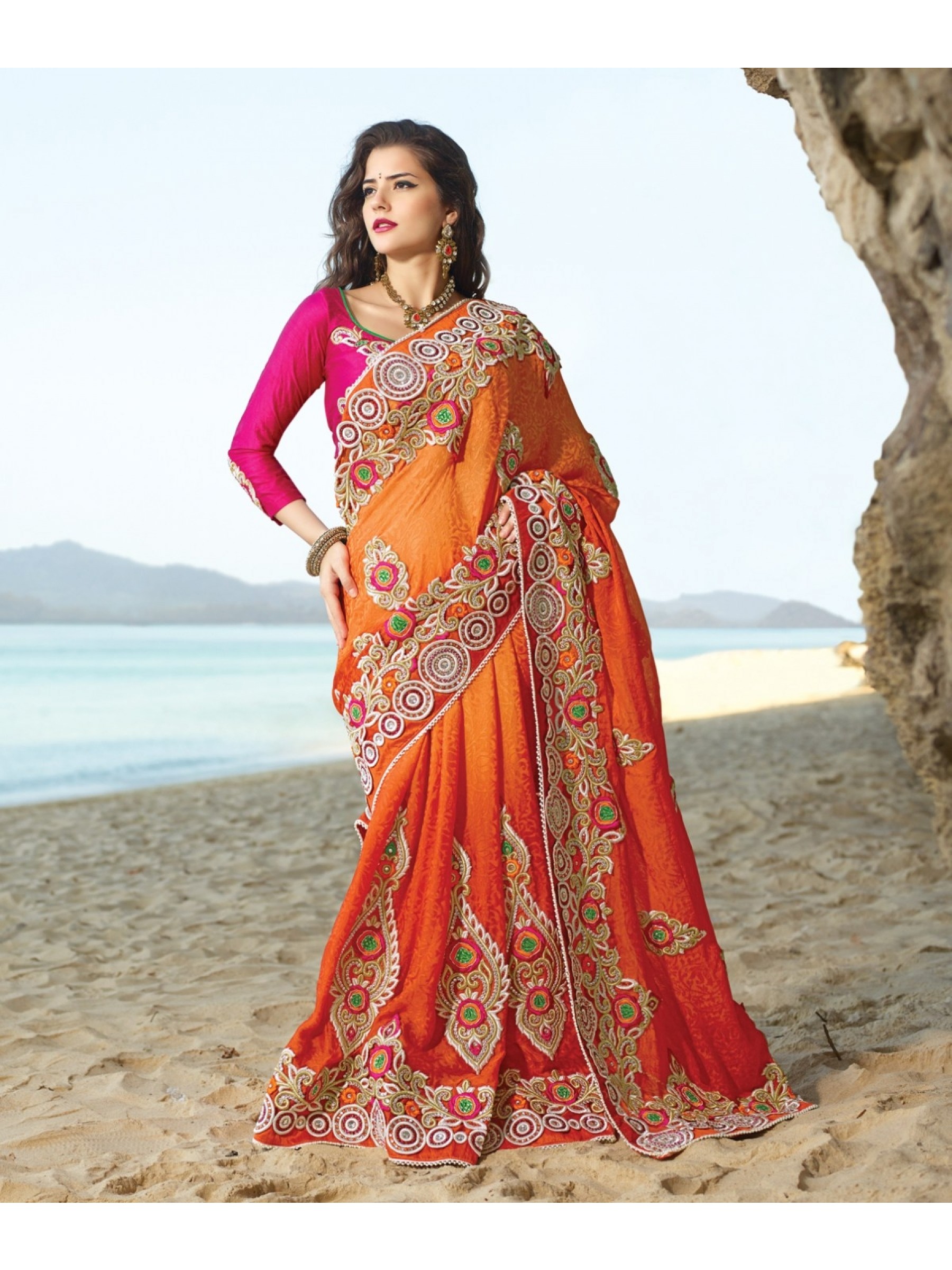 Jacquard Silk Party Wear Saree In Orange WIth Embroidery & Crystal Stone Work  