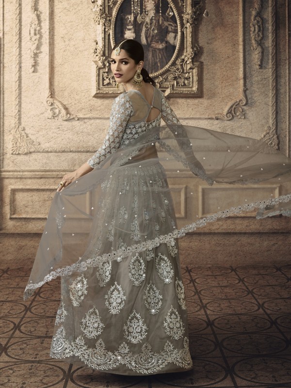 Soft Premium Net Wedding Wear Lehenga In Grey With Embroidery & Stone Work