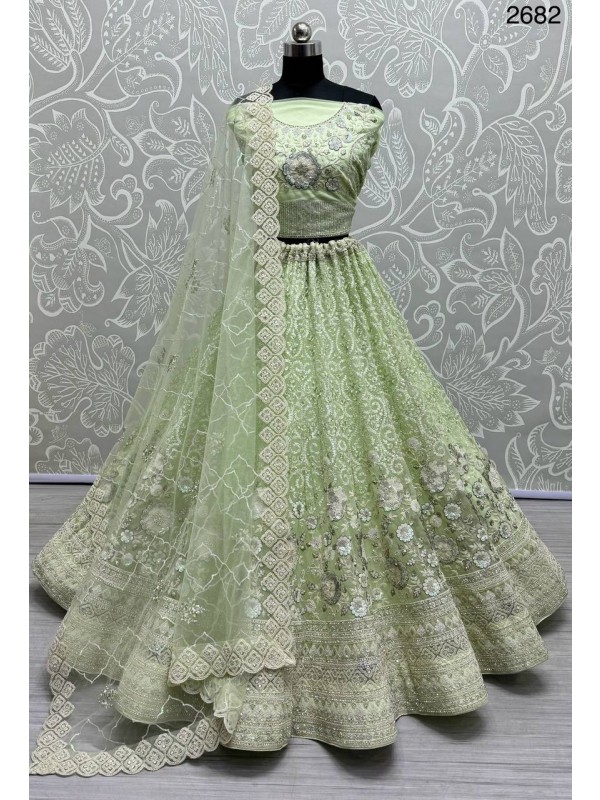 Soft Premium Net Wedding Wear Lehenga In Pista Color With Embroidery Work