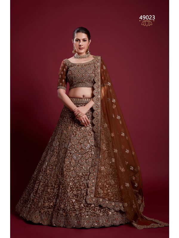 Soft Premium Net Wedding Wear Wear Lehenga In Brown Color With Embroidery Work 
