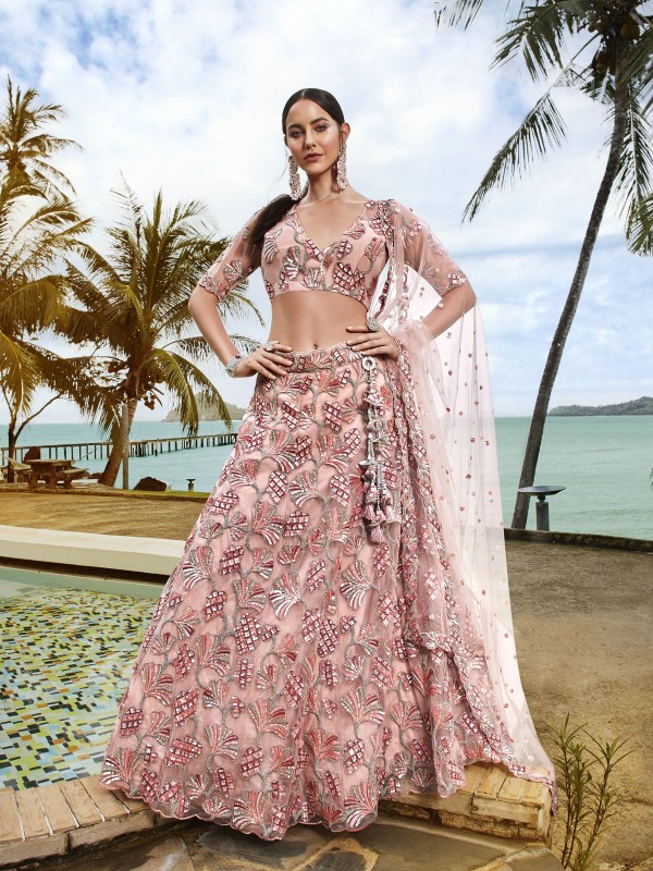 Soft Premium Net Party Wear Wear Lehenga In Coral Color With Embroidery Work 