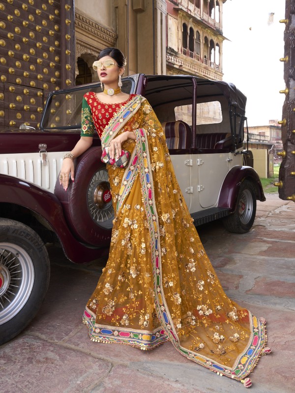 Soft Premium Net Wedding Wear Saree In Mustard Color With Embroidery Work 