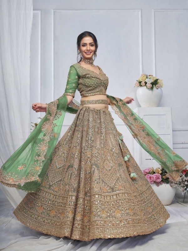 Soft Premium Net Wedding Wear Lehenga In Green Color With Embroidery Work