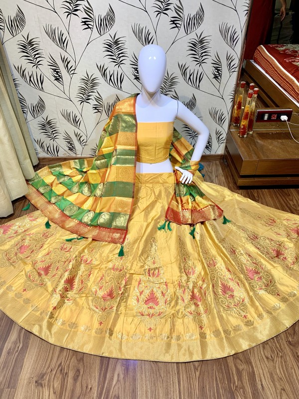 Pure Jecquard Silk Mehendi Sangeet Wear Lehenga In Yellow Color 