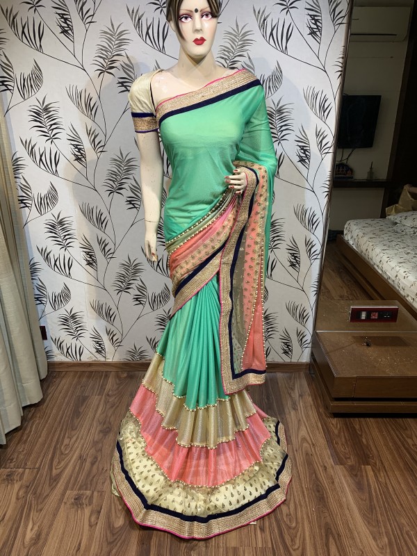 Fancy Imported Fabrics Party Wear Saree In Light Green With Embroidery Work & Pearl Work 