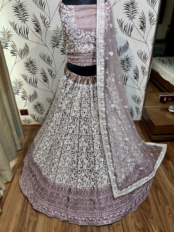 Soft Premium Net Wedding Wear Lehenga In Dusty pink With Luckhnowi Work & Stone Work