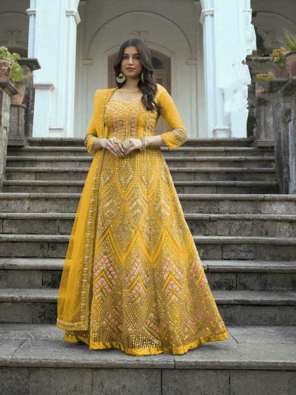 Butterfly Net Fabrics Party Wear  Gown In Yellow Color With Embroidery Work