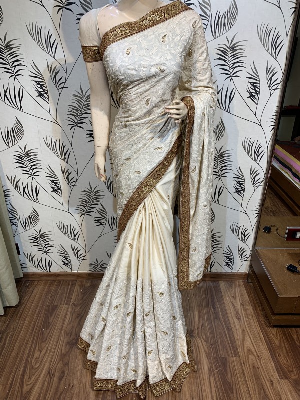 Metallic Silk Party Wear Saree In Off White WIth Embroidery Work & Crystal Stone work   