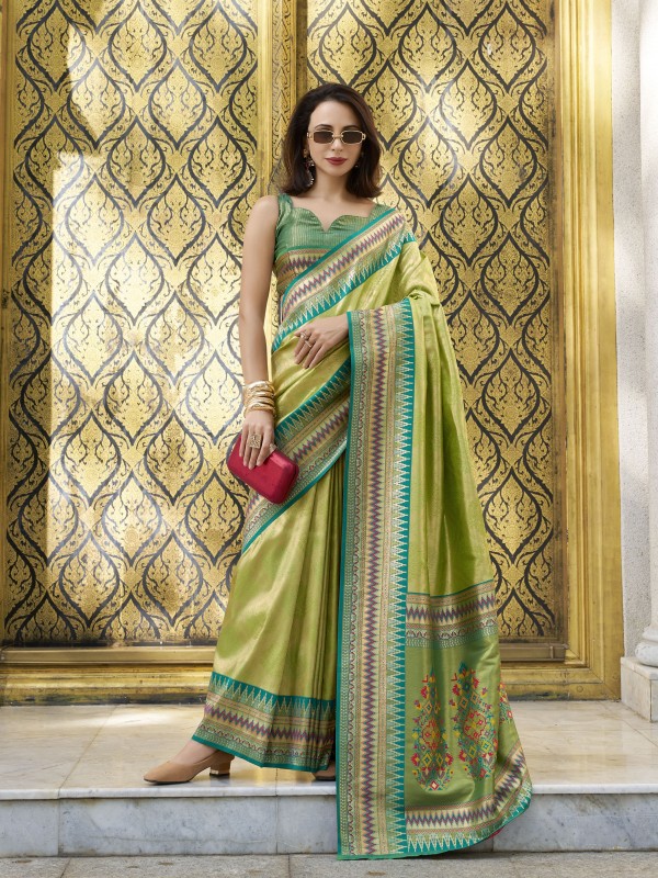 Tissue Silk Party wear Saree In Green Color with Zari Weaving 