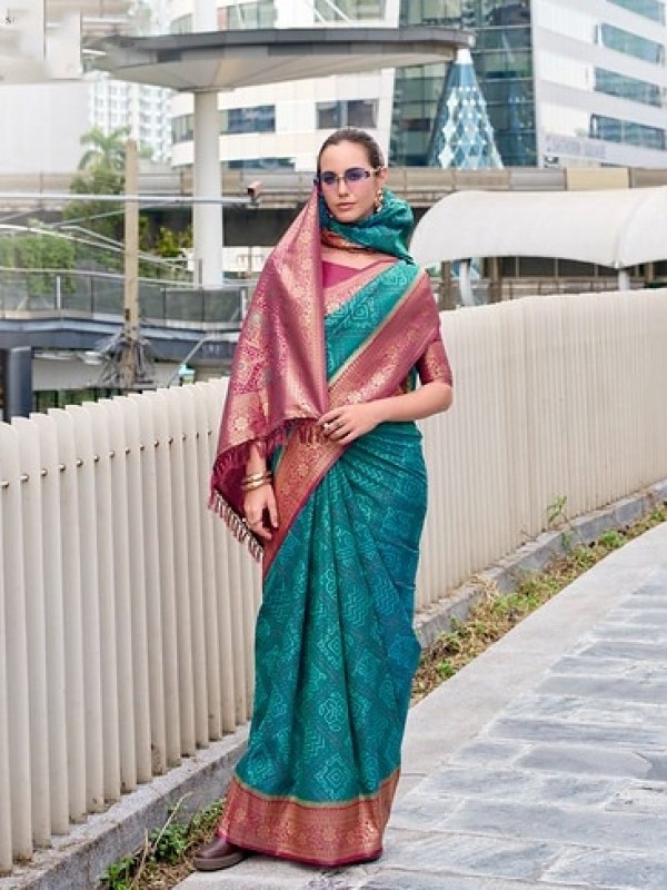 Soft Silk Party wear Saree In Turquoise Blue Color with Bandhani Weaving 