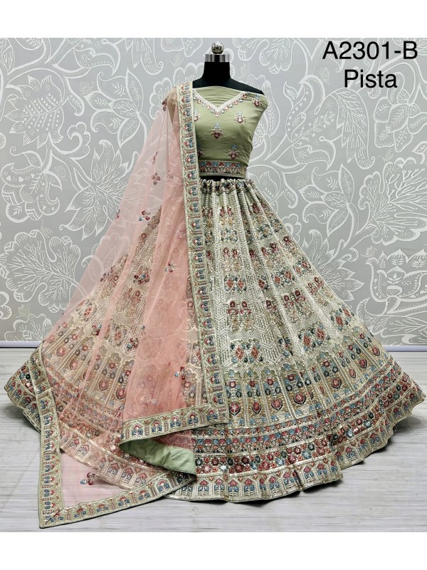 Pure Geogratte fabric Bridel Wear Lehenga In Pista Color With Embroidery Work