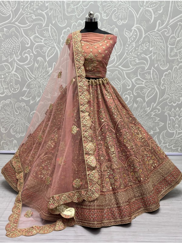 Soft Premium Net Wedding Wear Lehenga In Rose Gold Color  With Embroidery Work