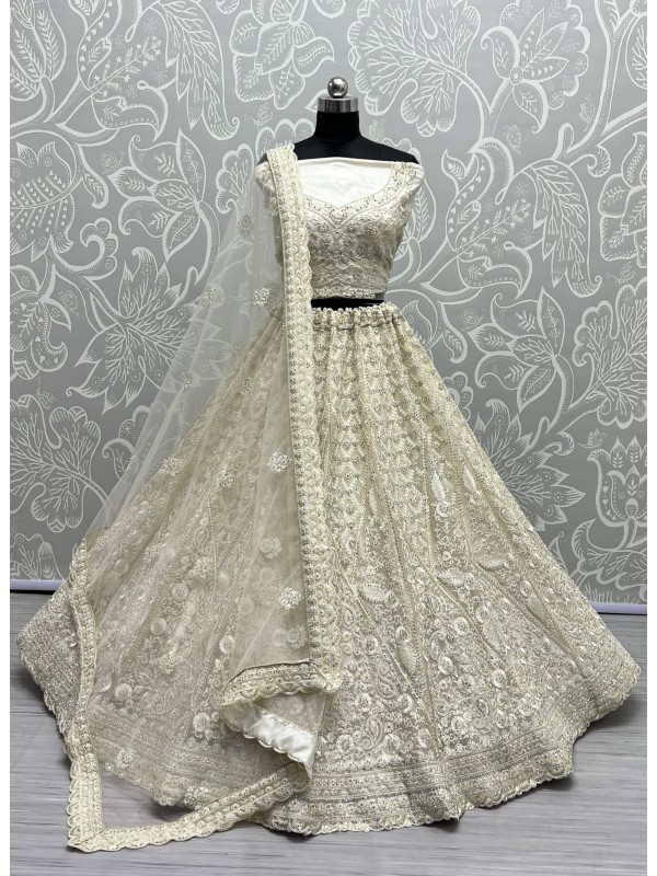 Soft Premium Net Wedding Wear Lehenga In Off White Color  With Embroidery Work