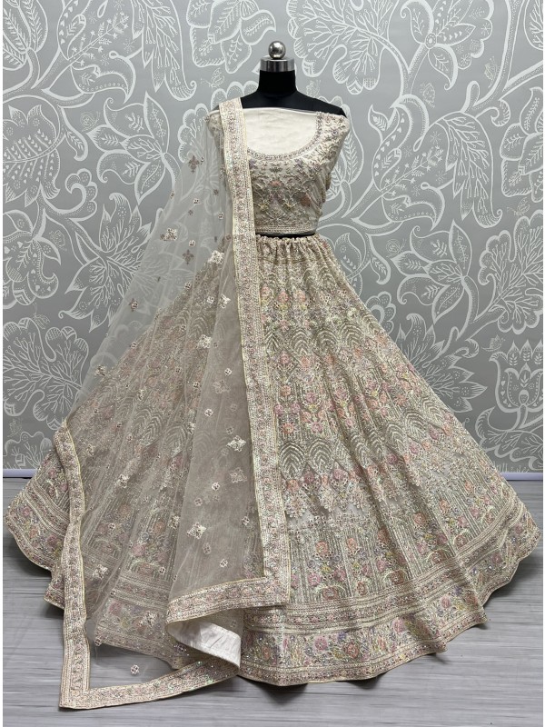 Soft Premium Net Wedding Wear Lehenga In Cream Color  With Embroidery Work