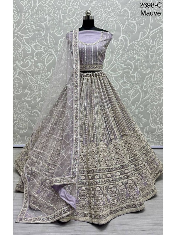 Soft Premium Net Wedding Wear Lehenga In Mauve Color With Embroidery Work